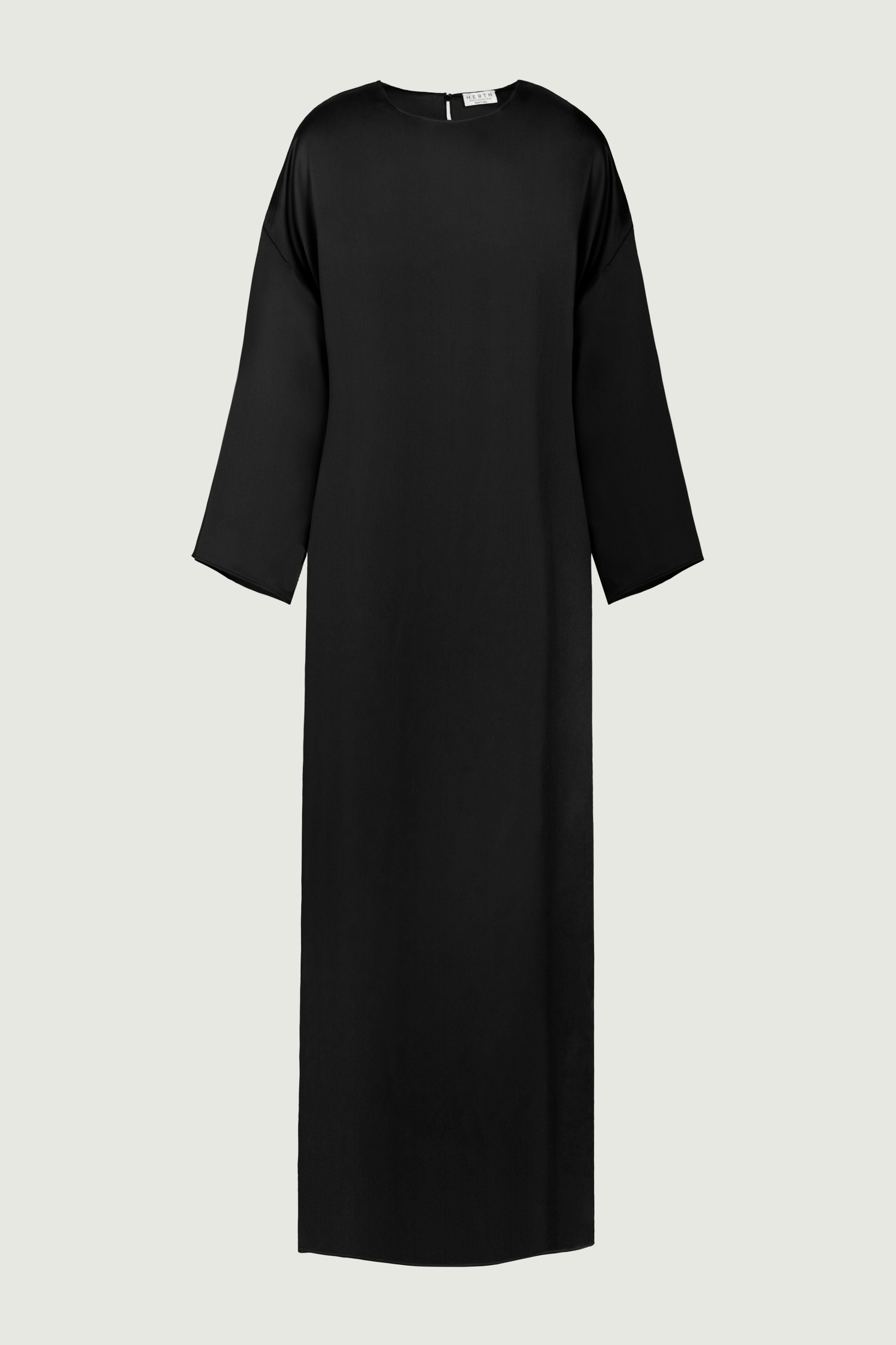 Black silk maxi dress with relaxed long sleeves and straight silhouette, front view highlighting clean lines and minimal structure