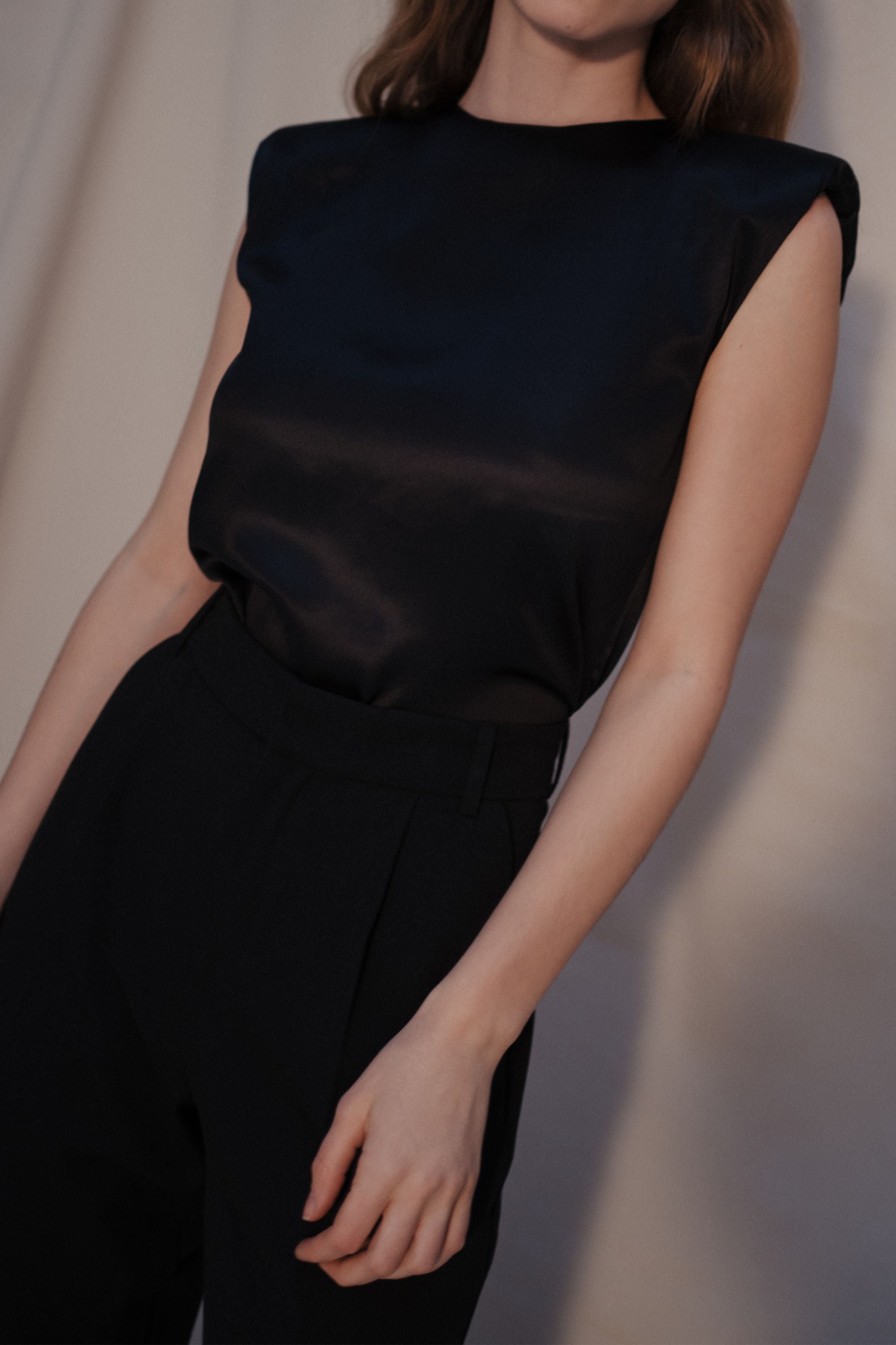 Model wearing black organic silk bodysuit, Amy bodysuit made in Italy, lifestyle shot