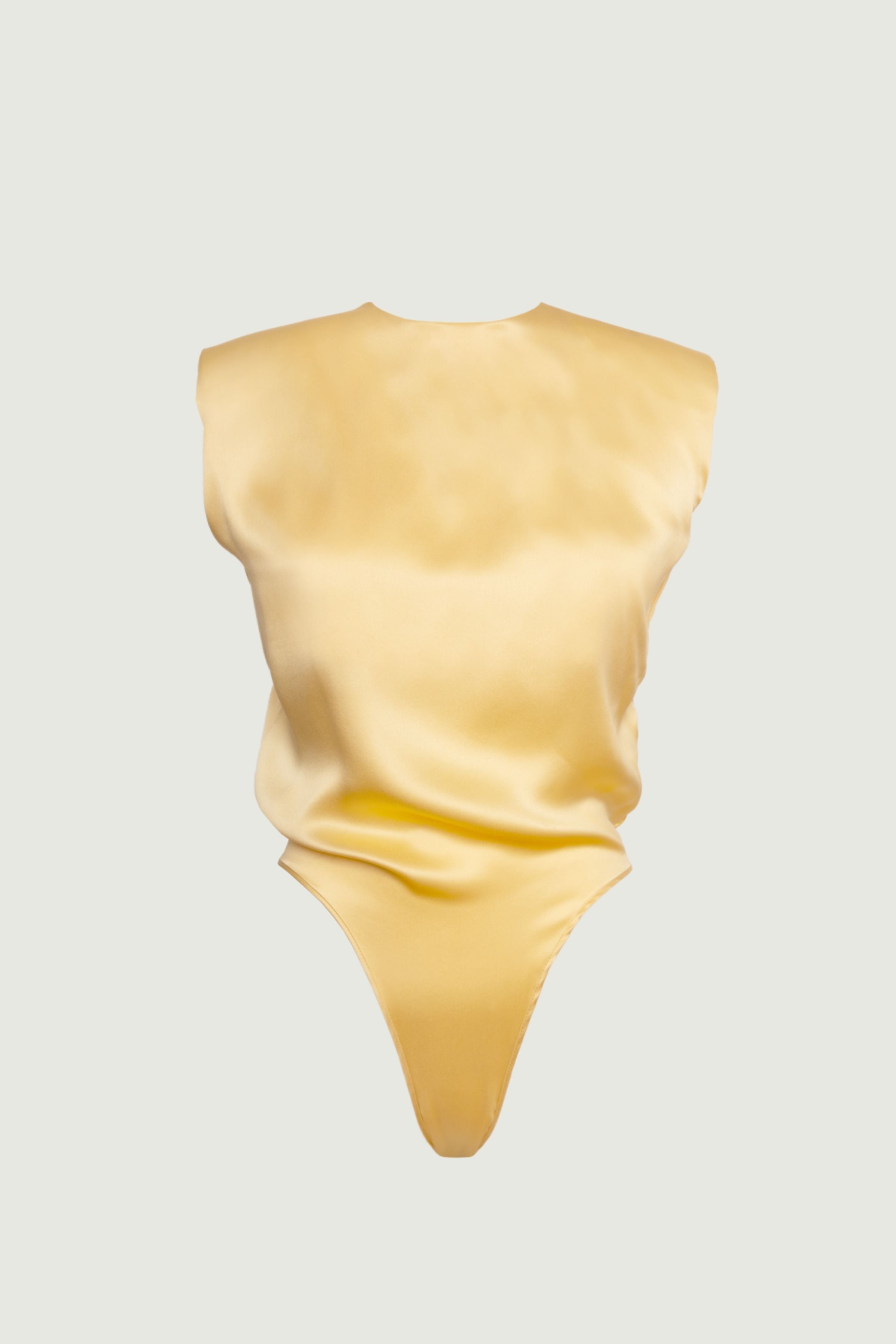 Amy bodysuit in desert organic silk with padded shoulders and soft fluid drape, minimalist womenswear made in Italy