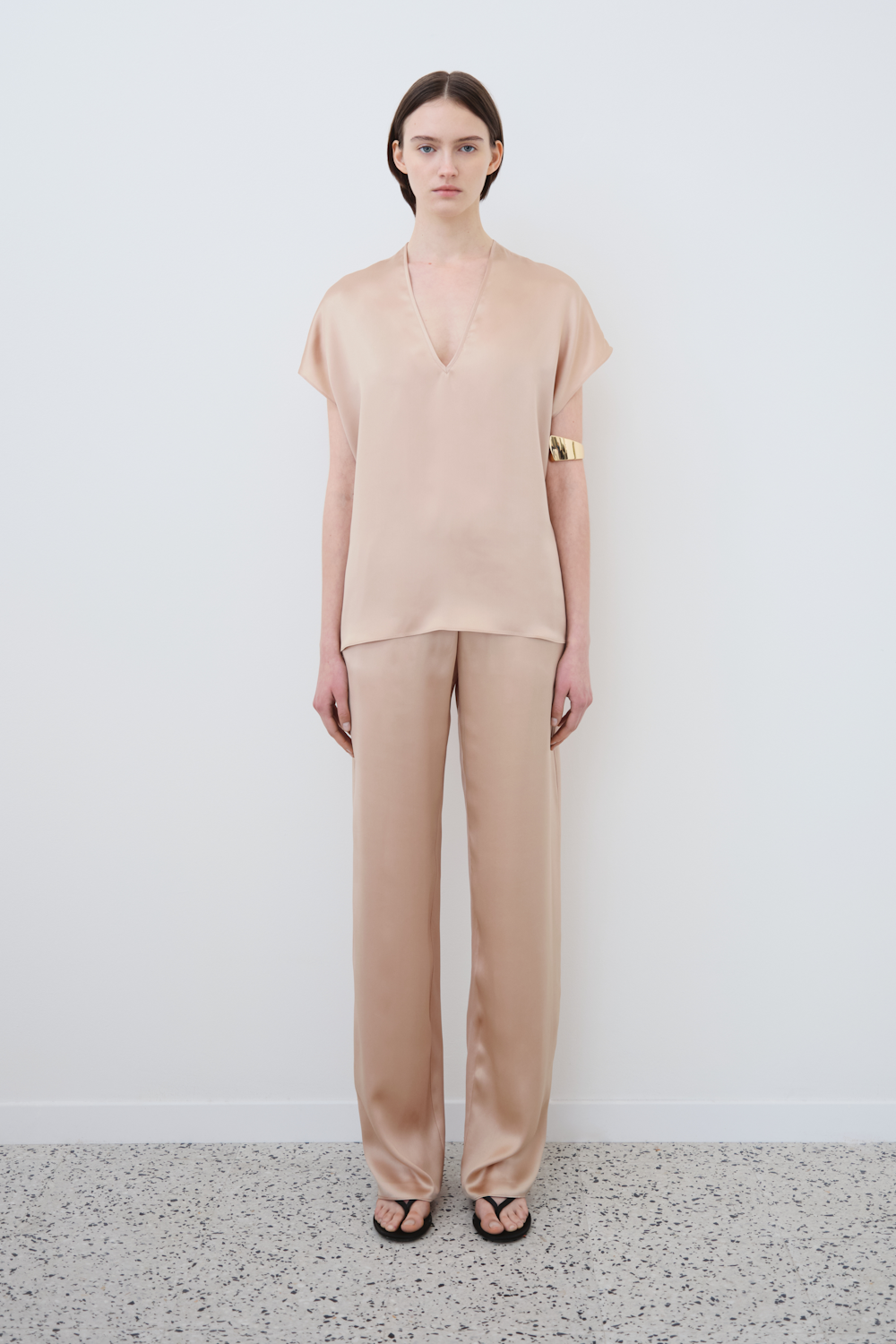 Front view of the Cleo silk top and James wide-leg trousers in Sand by HERTH — a conscious silk co-ord womenswear designed for timeless elegance and effortless style.