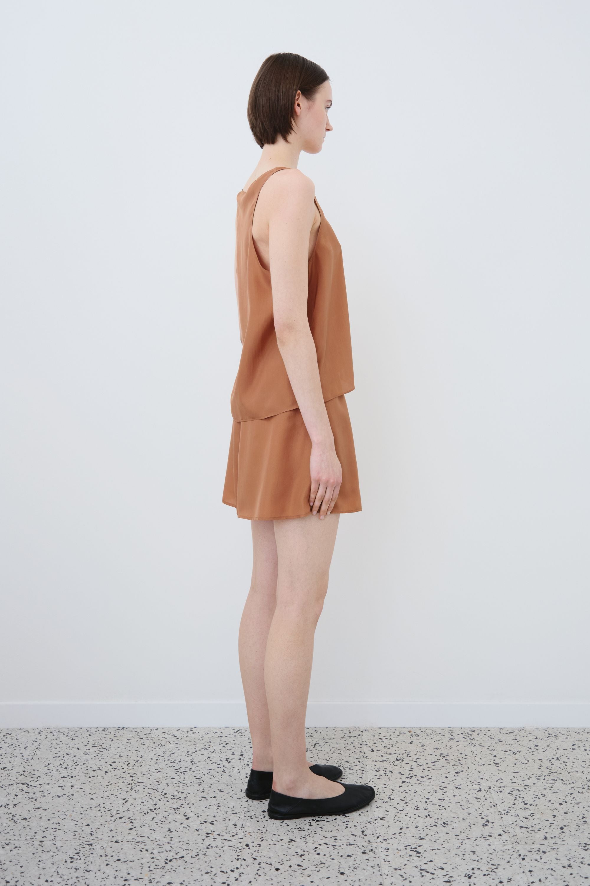 Side view of organic silk tank top and shorts set in earth tone, Eda tank and Hani shorts made in Italy