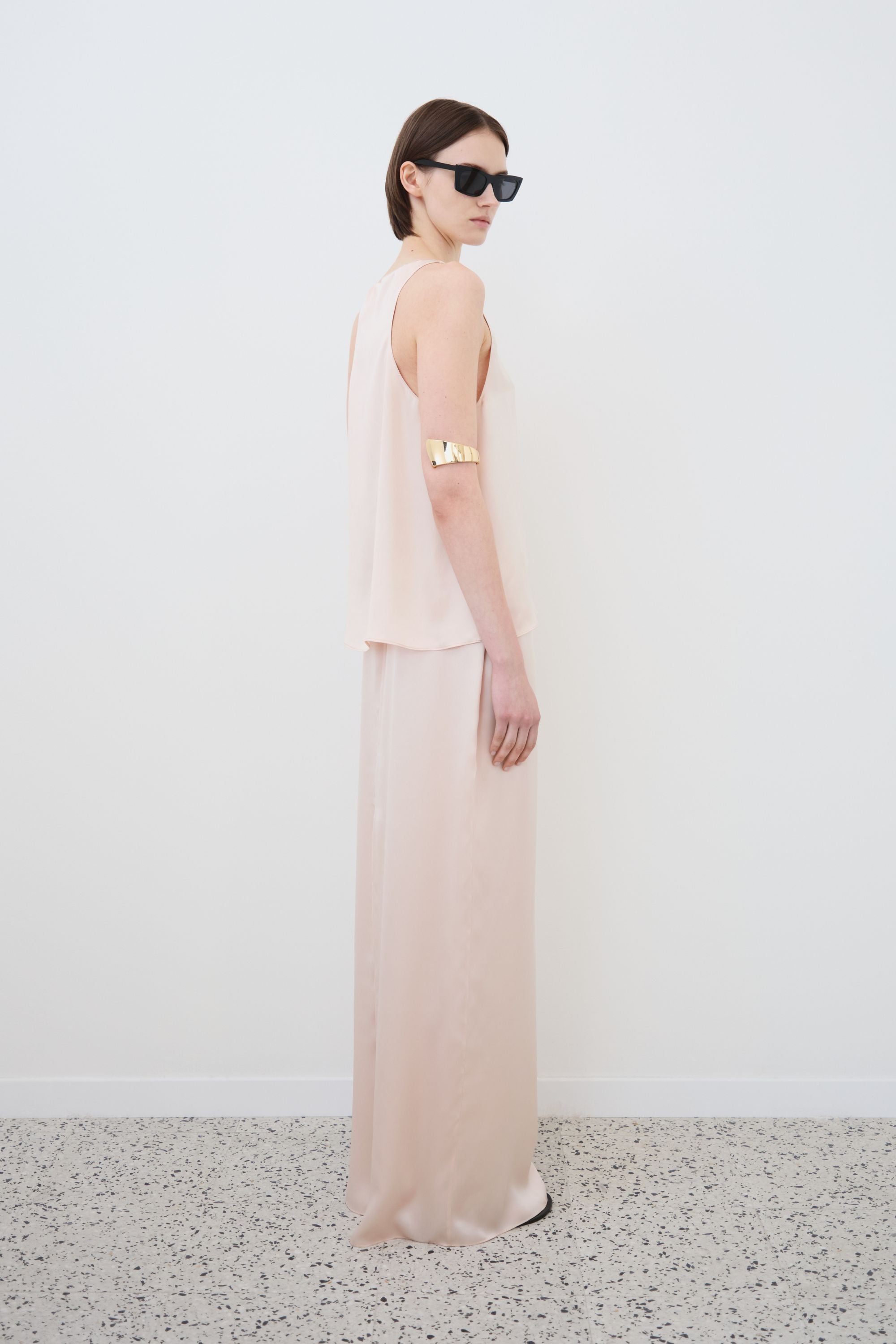 Side view of organic silk tank top and skirt set in whisper pink, Eda top and Nilde skirt made in Italy