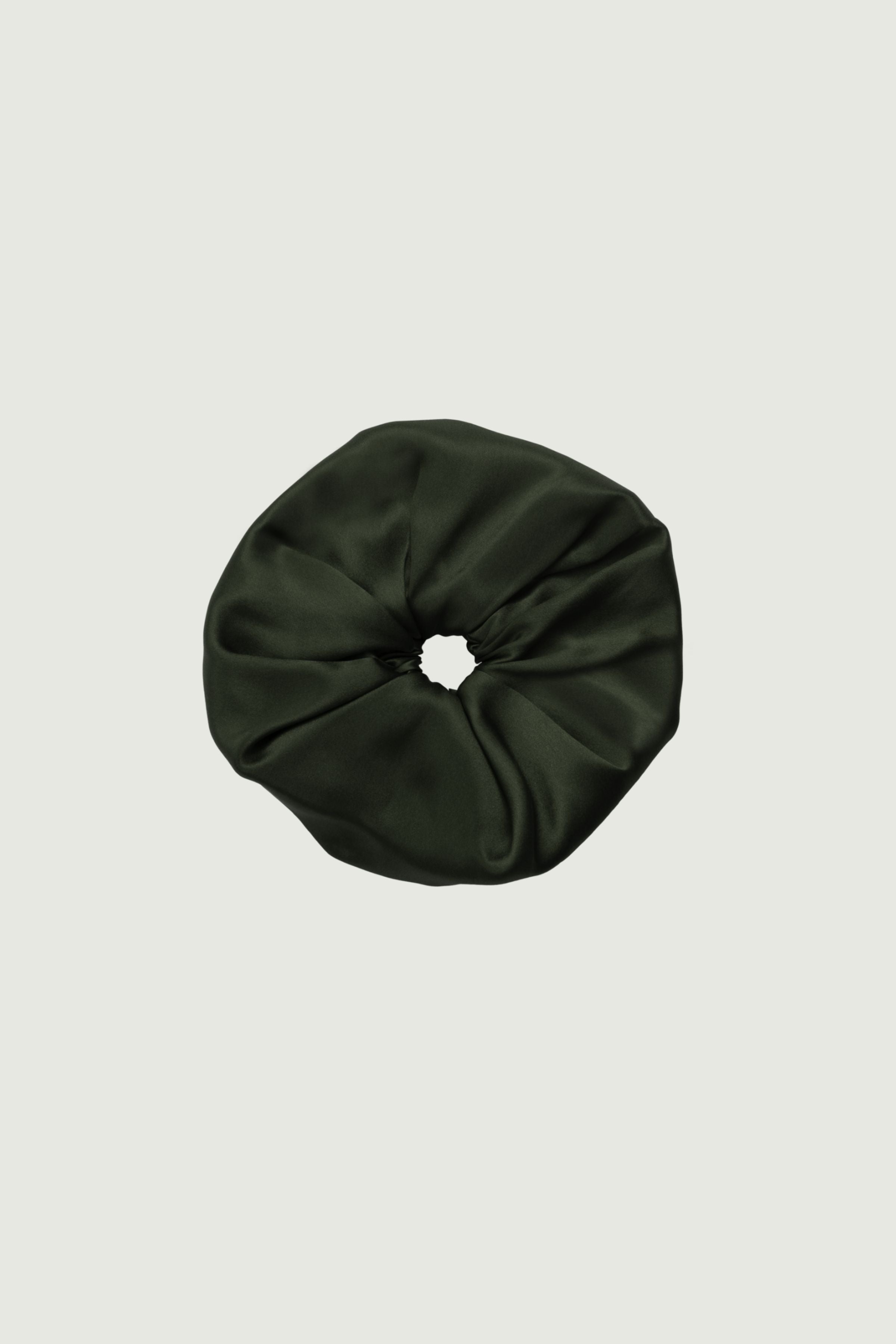 Green silk scrunchie hair accessory, single hair tie shown