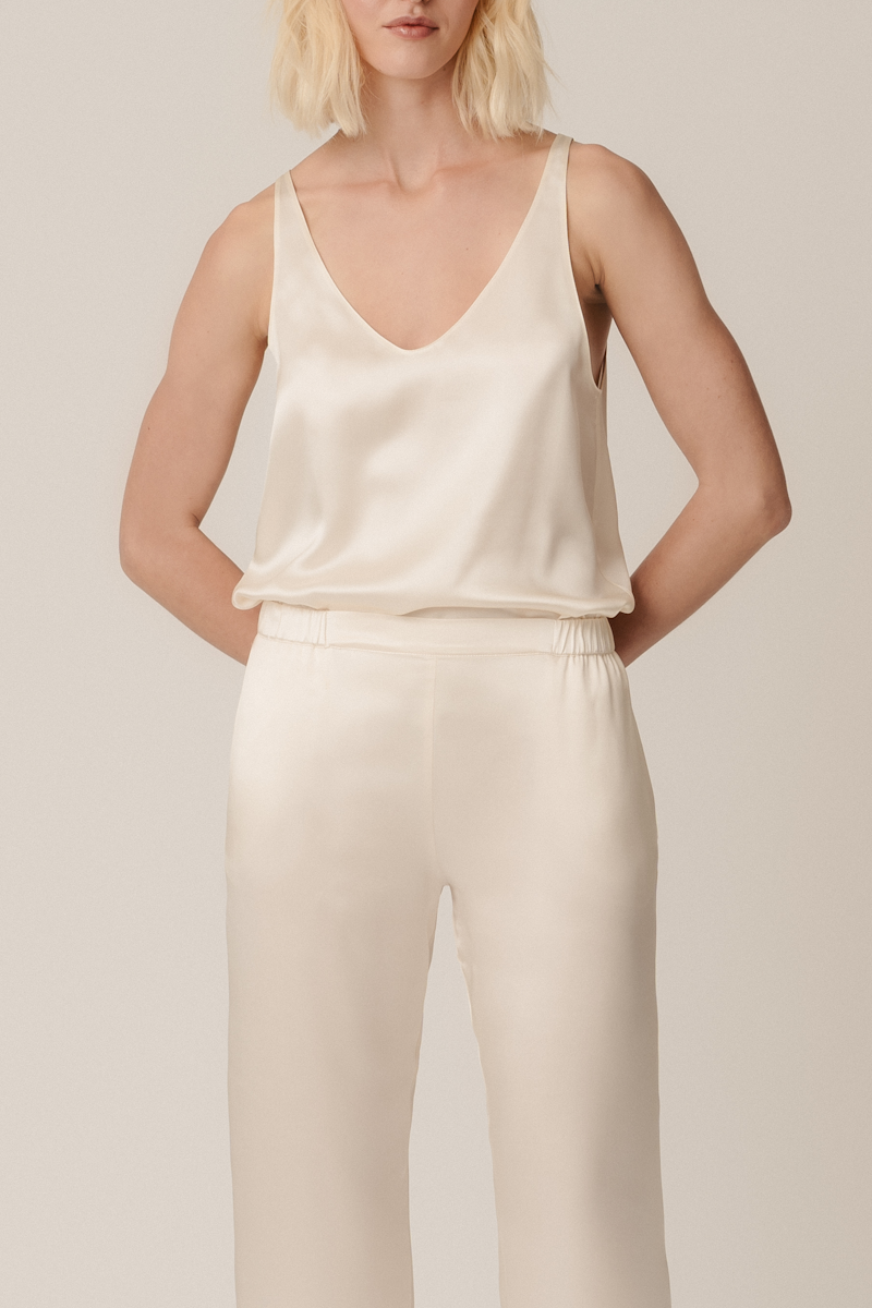 Front view of Else black top and Zeno almond trousers — sustainable silk womenswear outfit by HERTH with clean, elevated lines.
