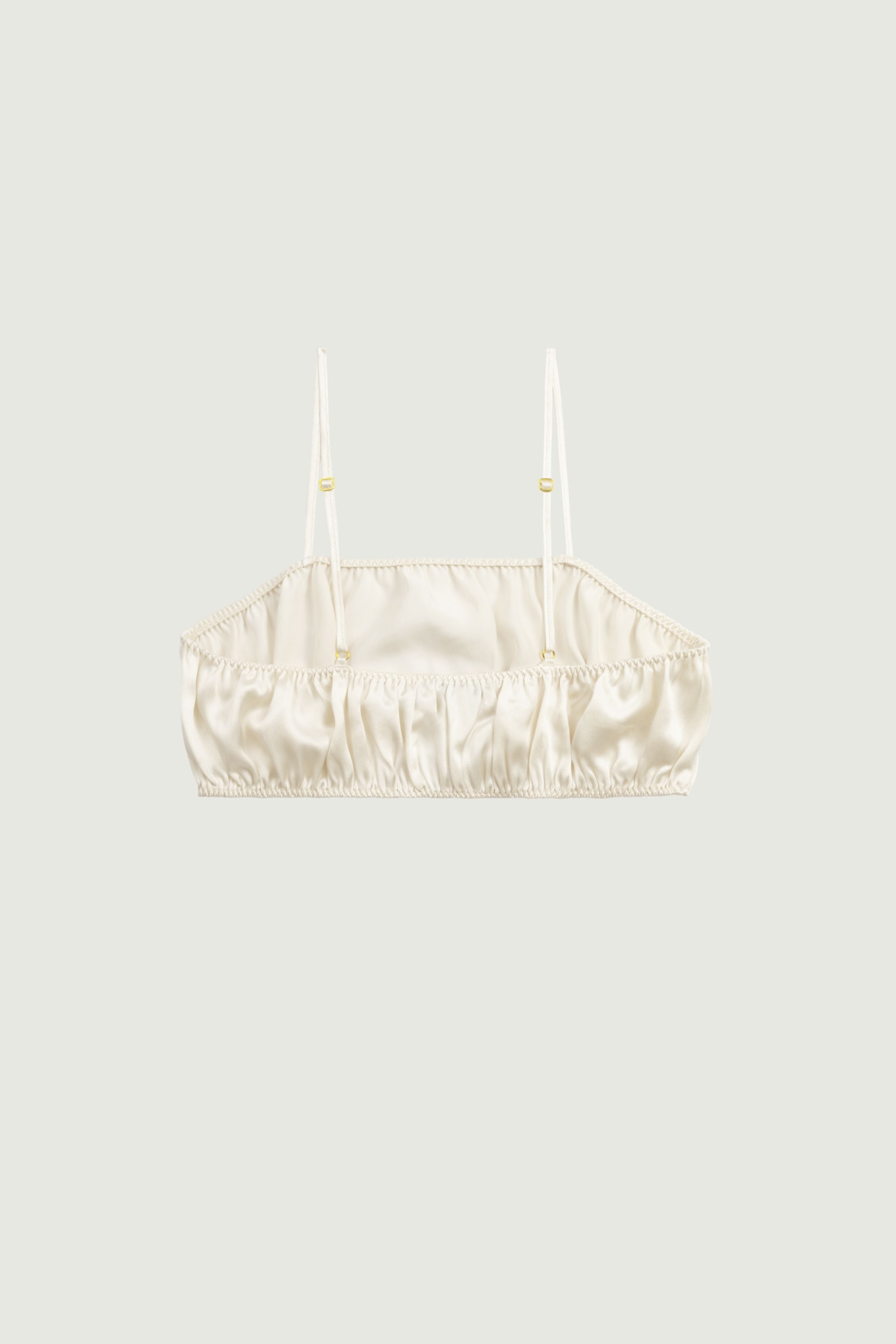 Eve bandeau in organic silk almond color back view with adjustable straps and soft gathered silhouette, minimalist lingerie made in Italy
