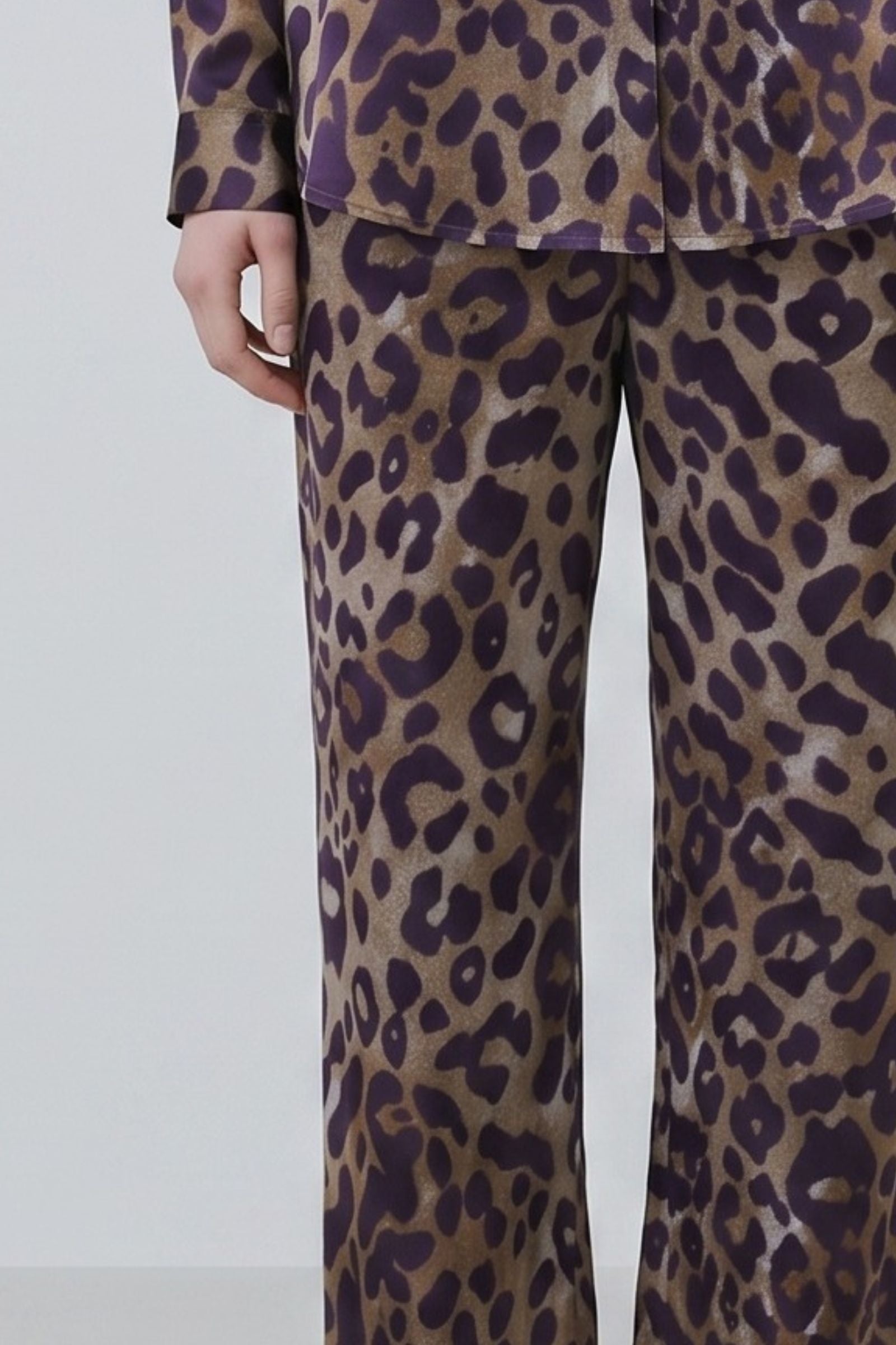 Leopard print organic silk trousers detail at waist and thigh, fluid drape and coordinated pattern, crafted in Italy