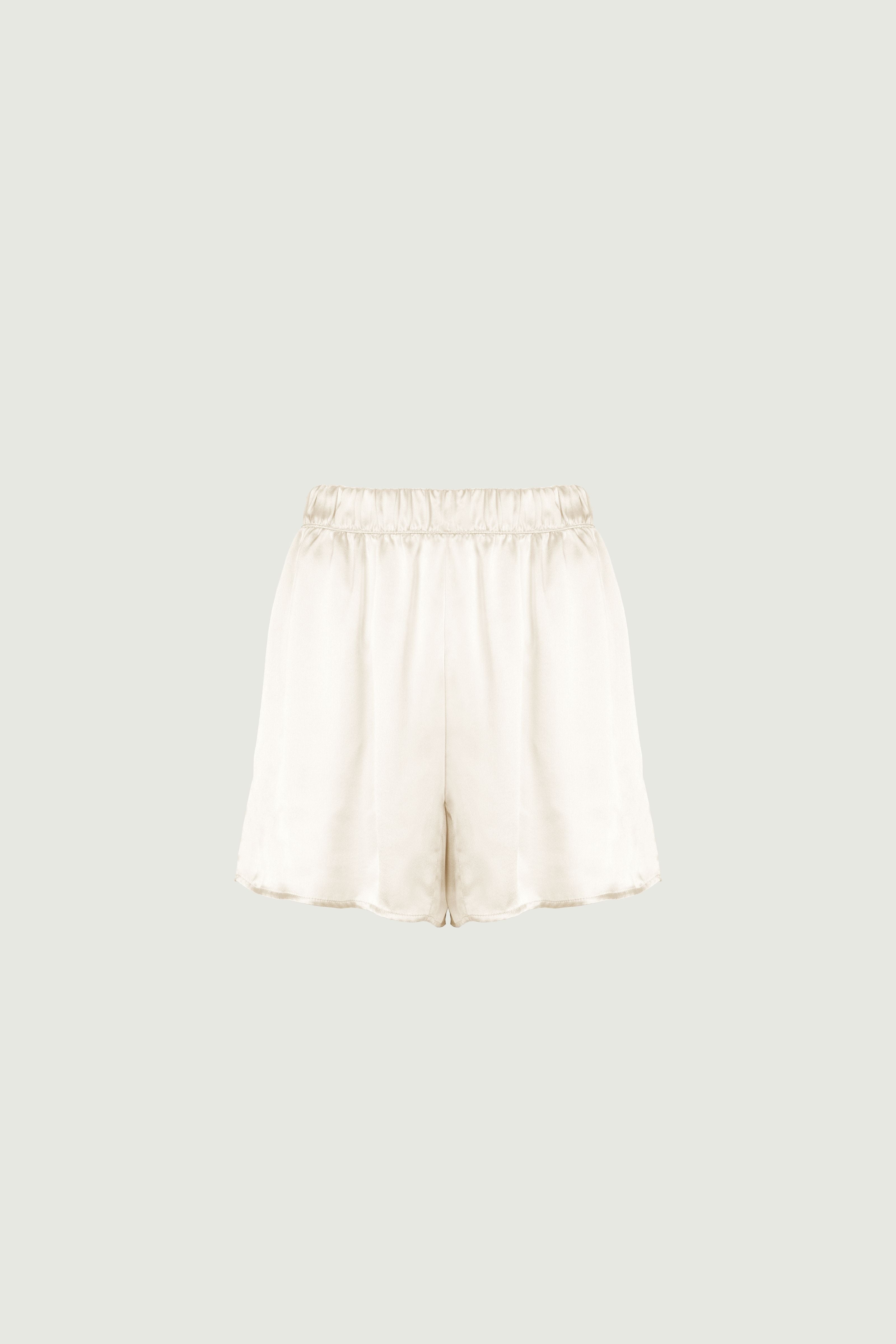 Organic silk wide-leg shorts in almond tone, elastic waistband and side pockets — HERTH