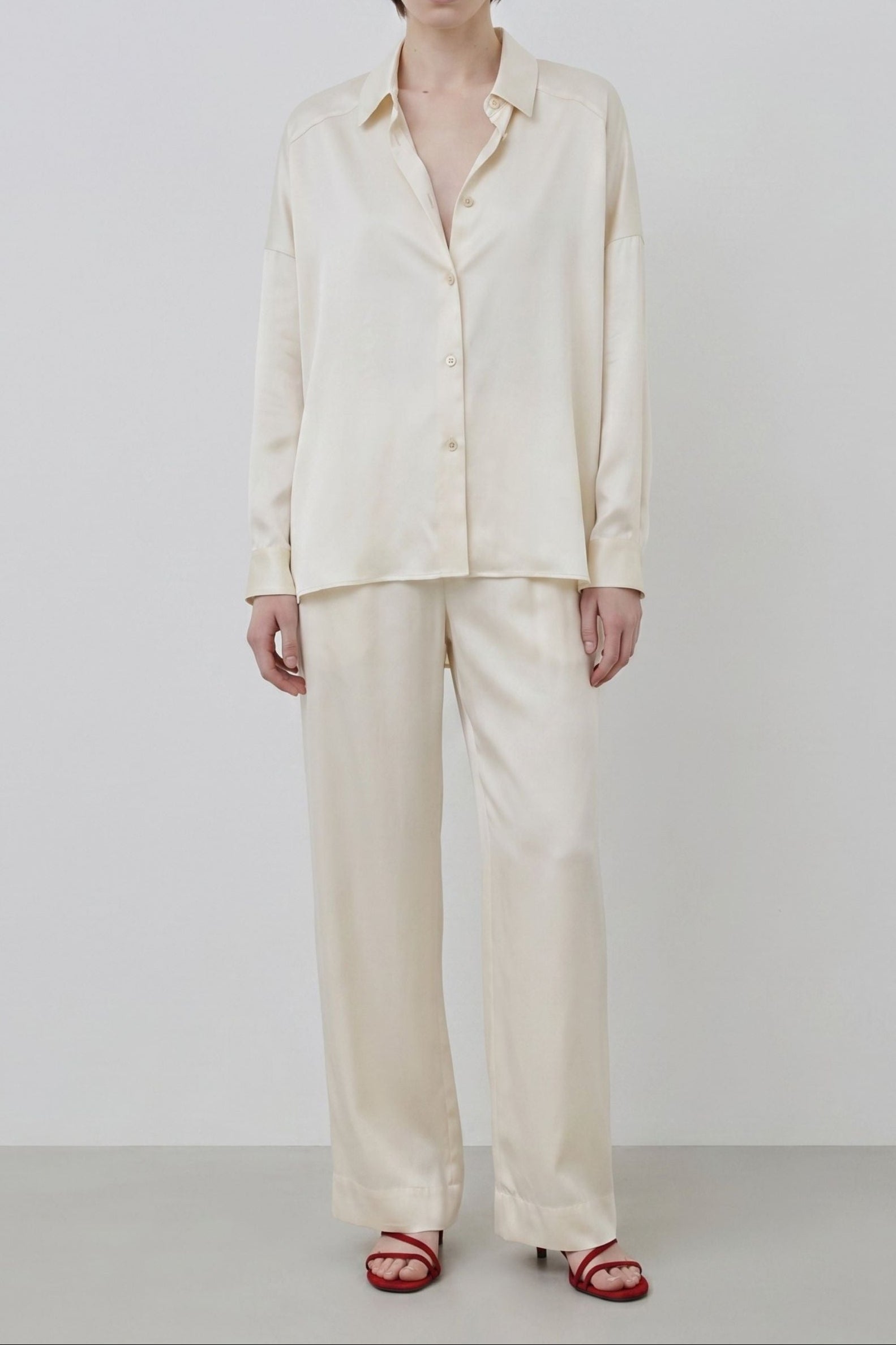 Tara almond organic silk shirt worn with Zeno trousers, relaxed silhouette with fluid drape, crafted in Italy