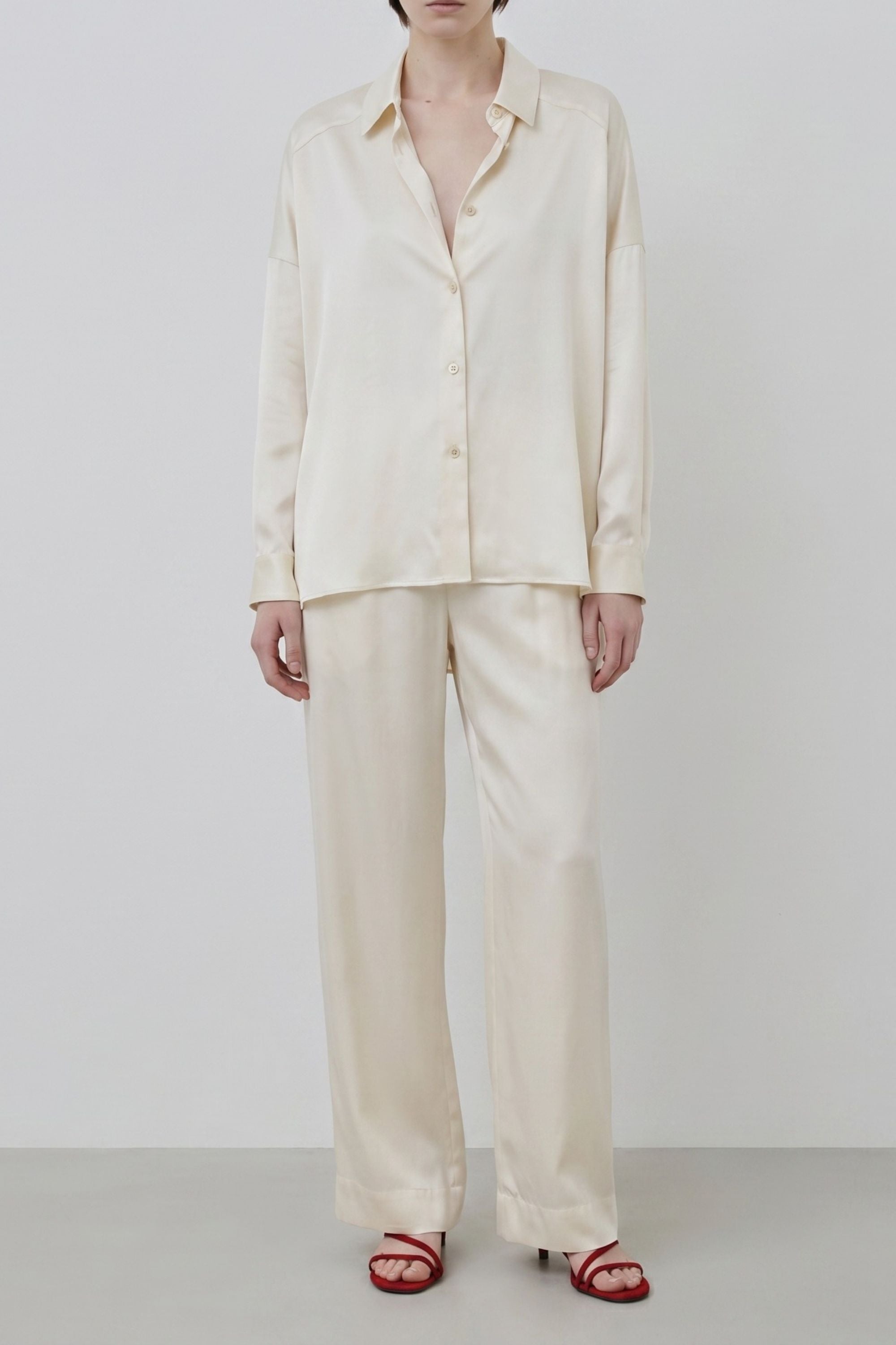Tara almond organic silk shirt worn with Zeno trousers, relaxed silhouette with fluid drape, crafted in Italy
