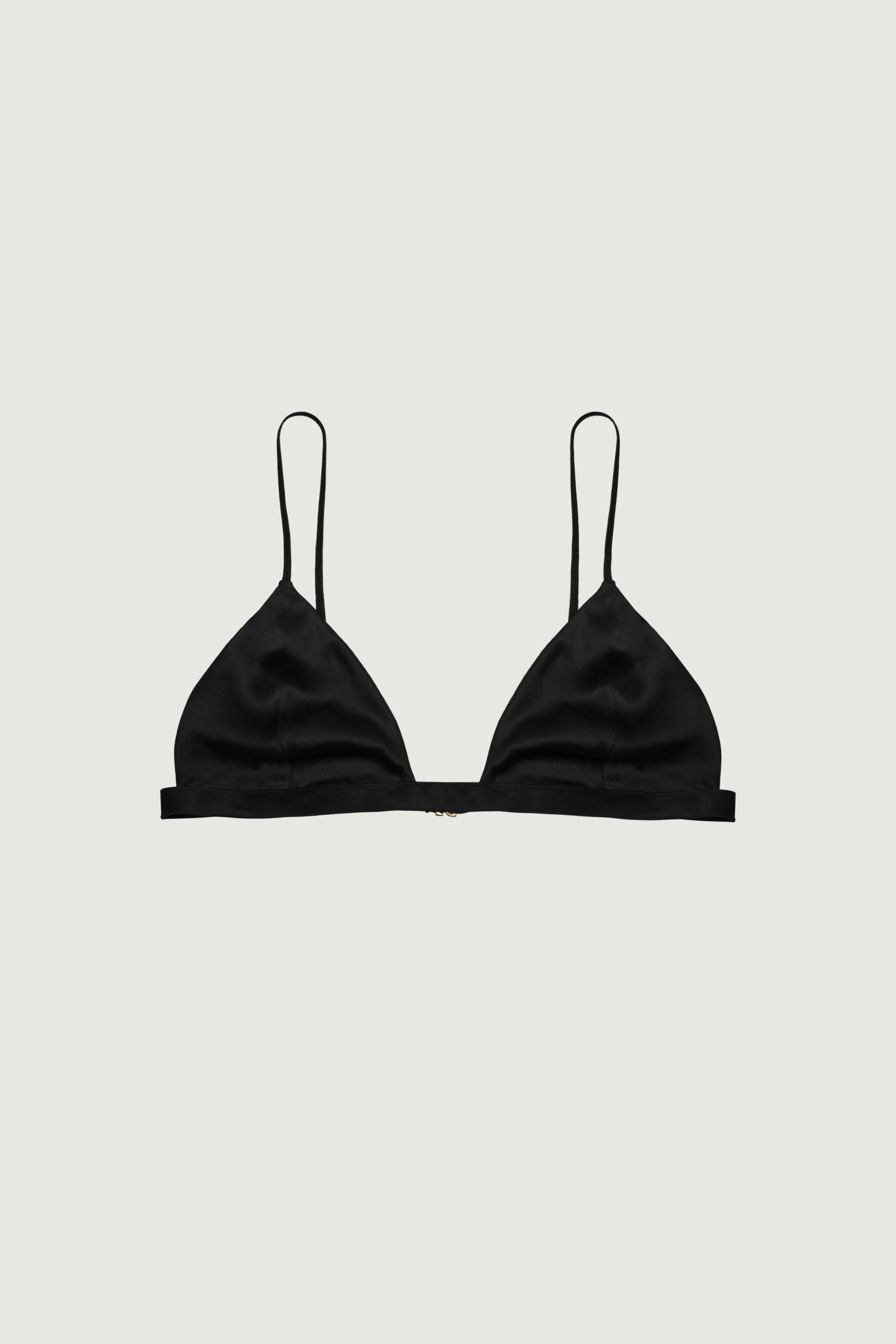 Black silk triangle bra with soft minimal cups and thin adjustable straps, clean front view highlighting lightweight structure and natural shape