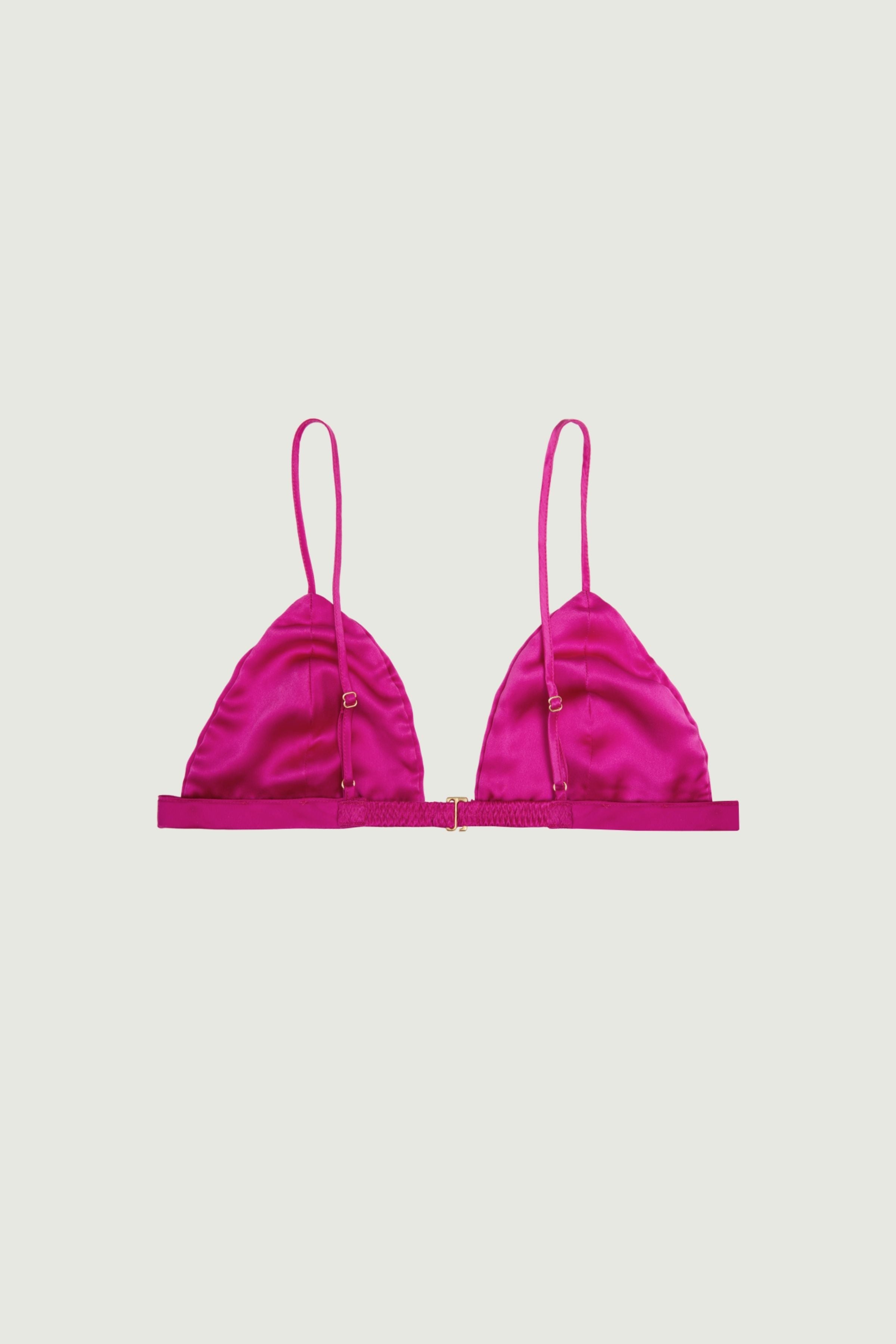 Hot pink silk triangle bra back view with adjustable straps and hook closure, smooth band and fluid construction with a bold finish