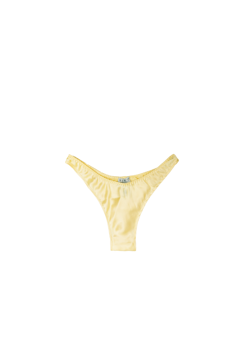 Jude high cut leg panty in Butter Yellow organic silk — soft and sustainable lingerie piece crafted by HERTH with GOTS-certified silk.