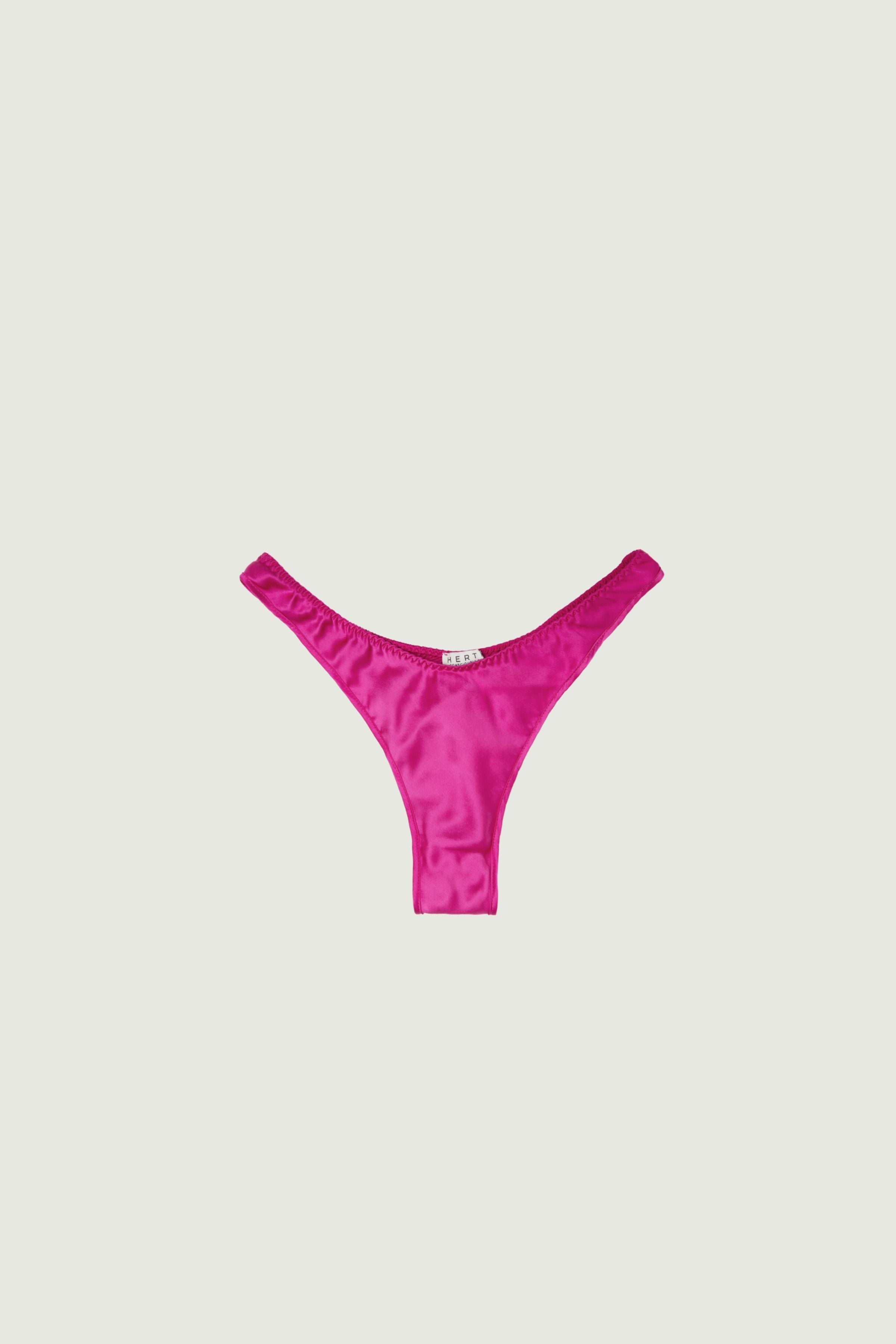 Hot pink silk high-cut panty with minimal coverage, front view highlighting high-cut leg and bold vibrant tone