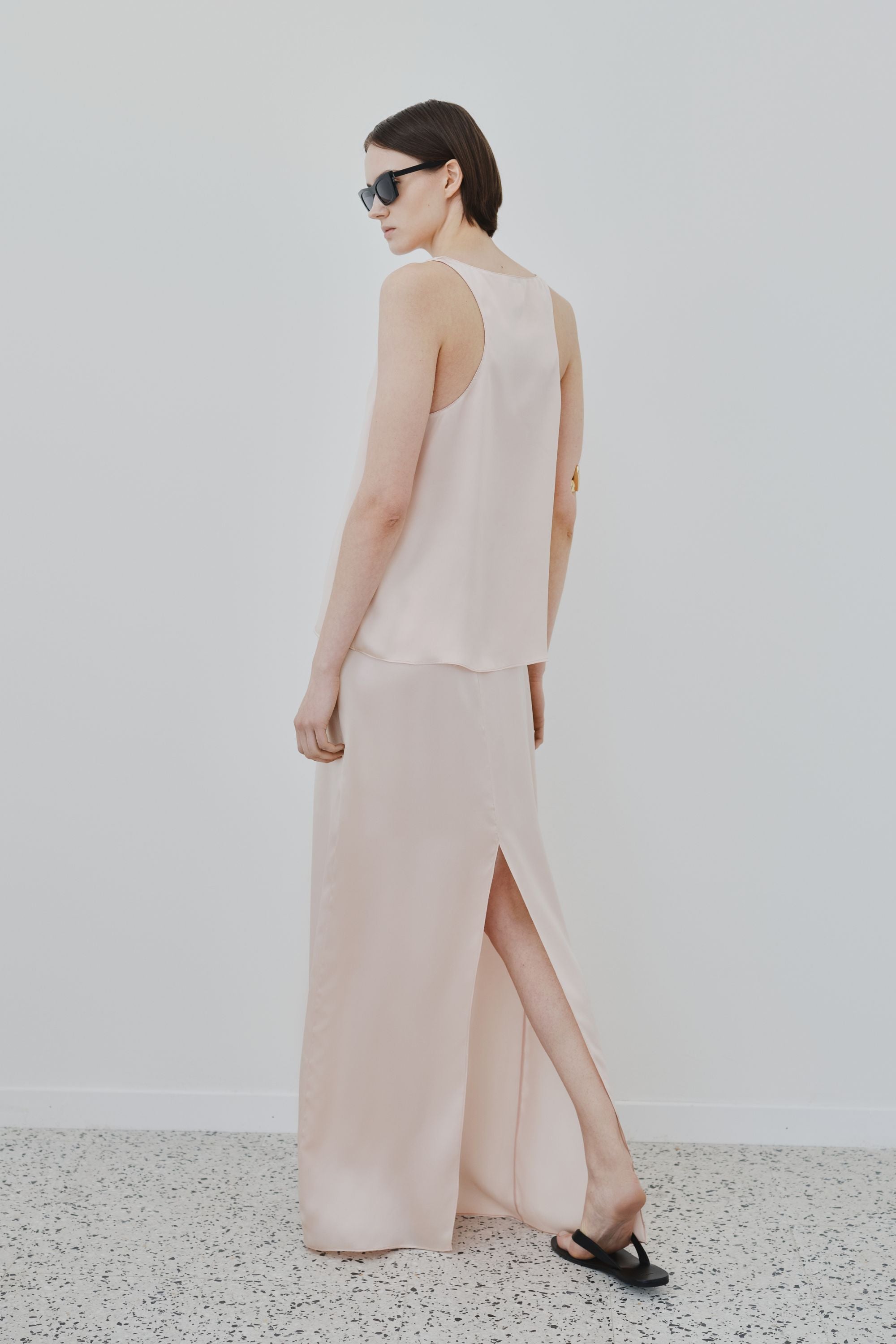 Back view of organic silk maxi skirt in whisper pink, Nilde skirt made in Italy