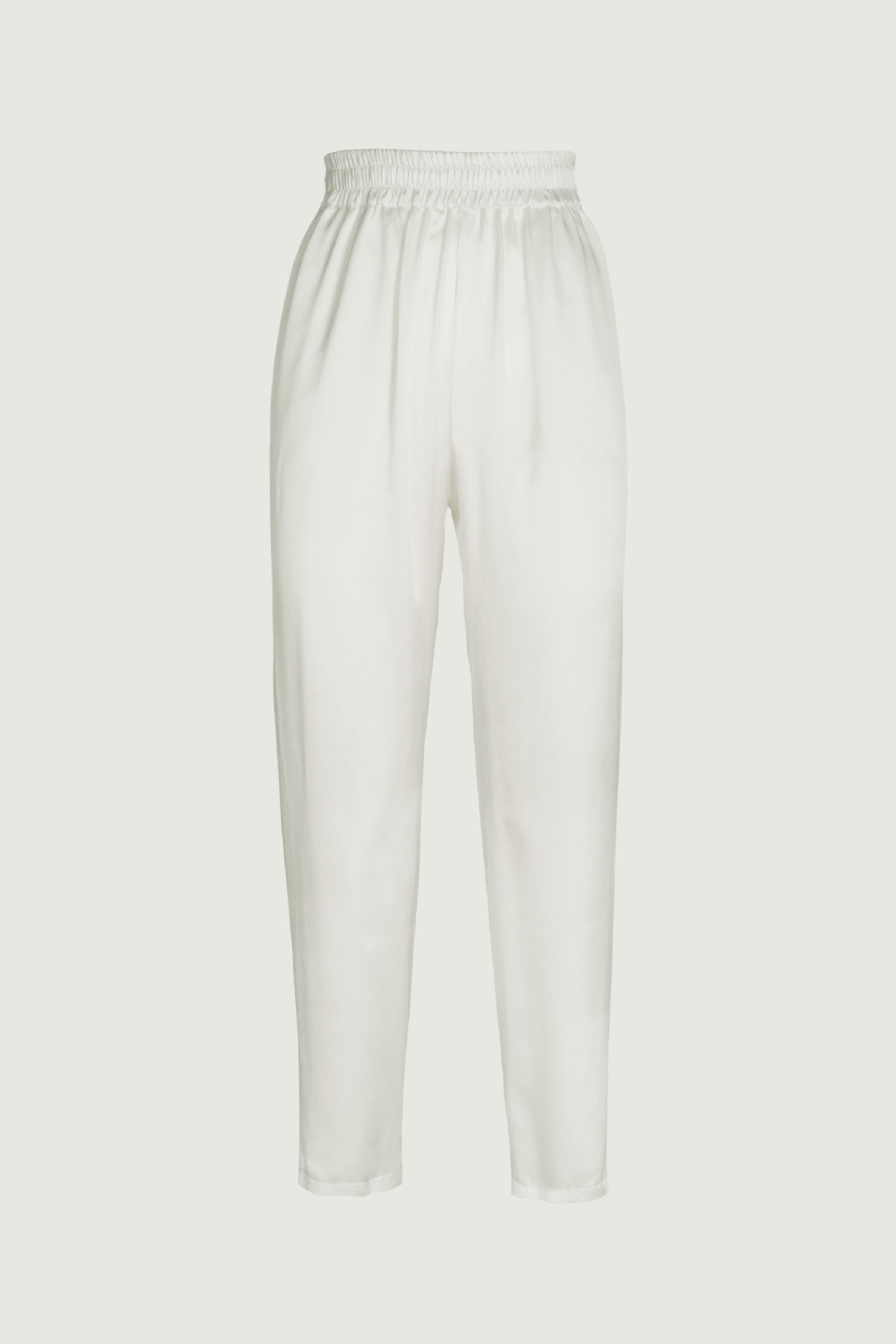 Ivory organic silk high-waist tapered trousers with elastic waistband and soft drape, minimalist design, front view, made in Italy