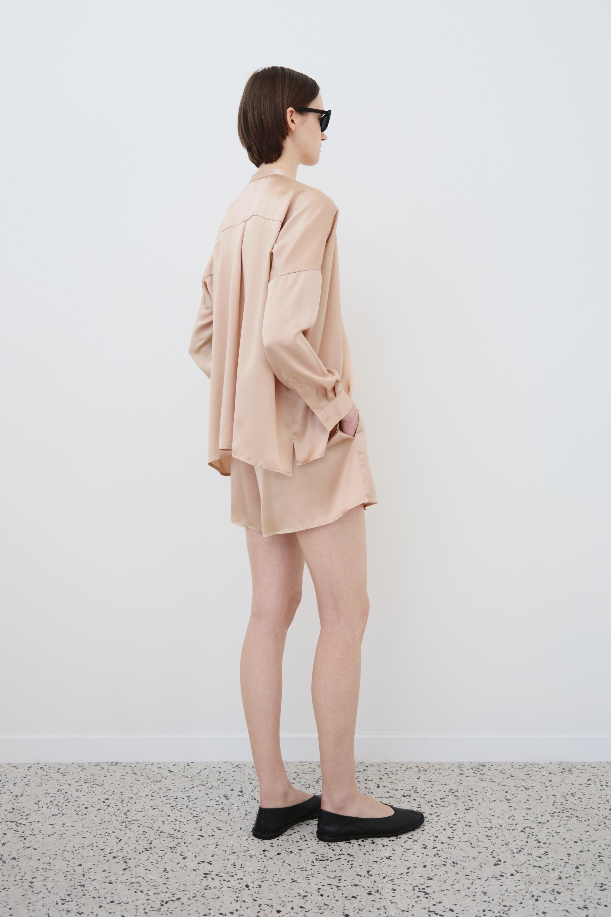 Back view of organic silk shirt and shorts set, Tess shirt and Hani shorts made in Italy