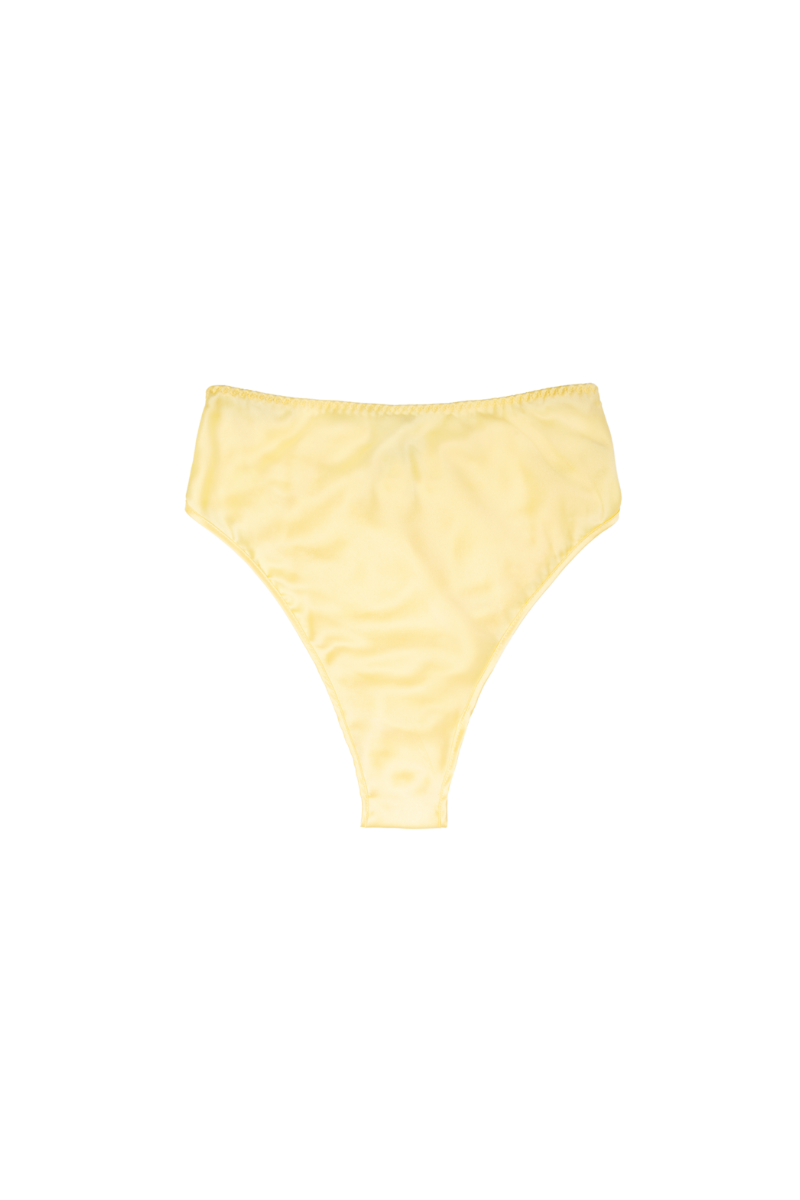 Thea high-waist panty in butter yellow – organic silk lingerie designed for comfort, softness, and a minimal aesthetic by HERTH.