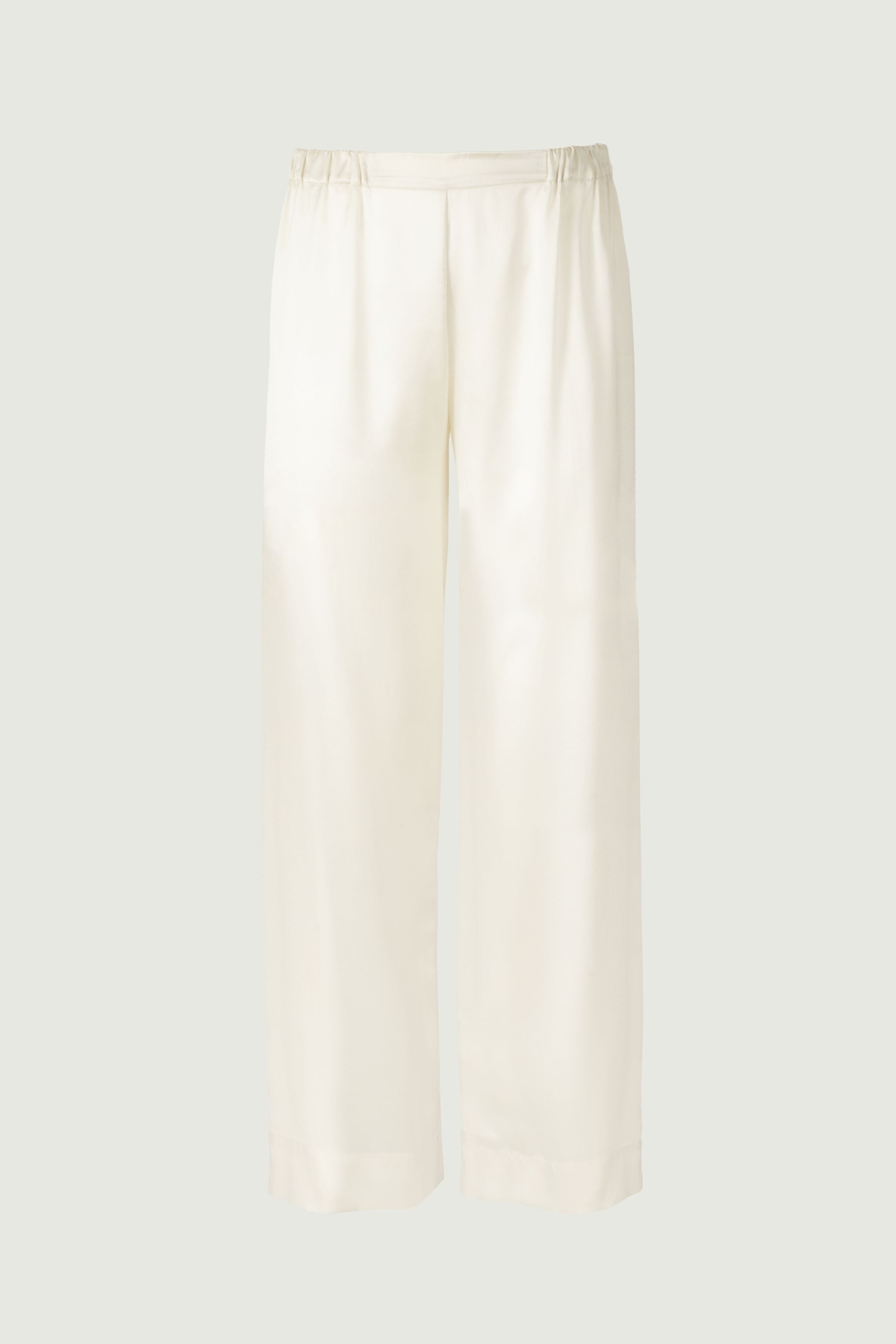 Almond organic silk wide-leg trousers with soft drape and elastic waistband, relaxed minimalist design, front view, made in Italy
