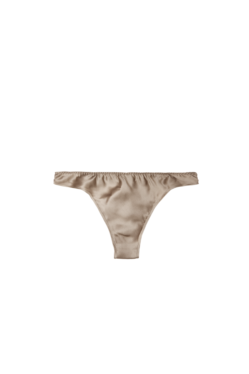 Low-rise panty in GOTS-certified organic silk, Gold Sand shade — soft and minimal lingerie by HERTH