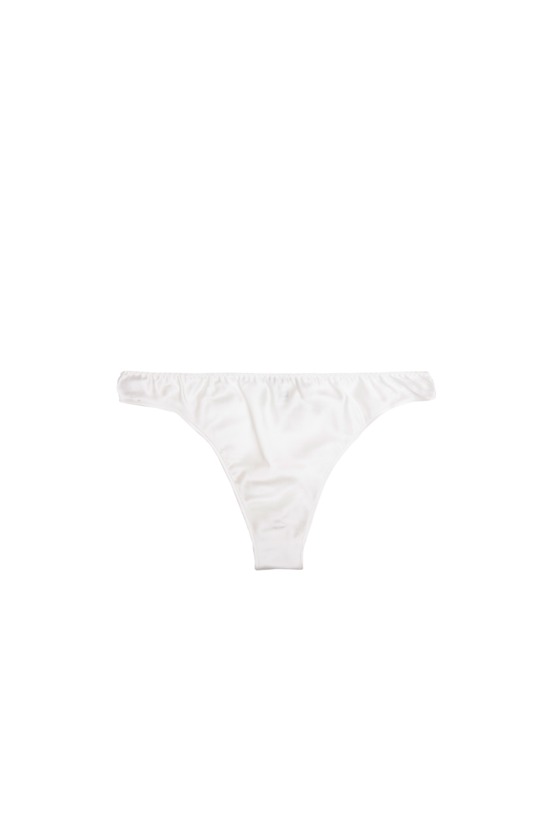 Low-rise panty in GOTS-certified organic silk, Ivory shade — essential soft lingerie by HERTH
