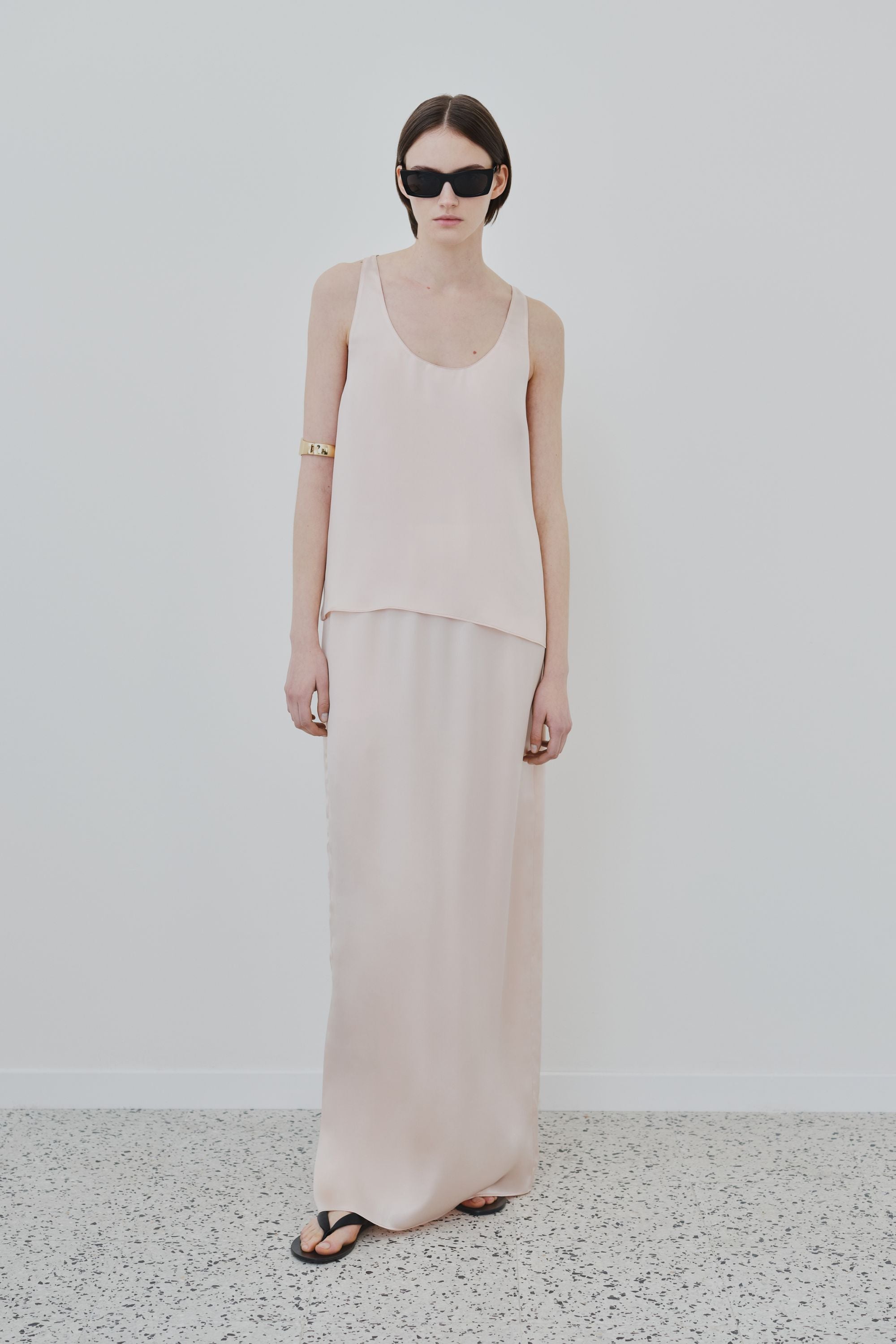 Model wearing organic silk tank top in whisper pink, Eda top made in Italy, front view