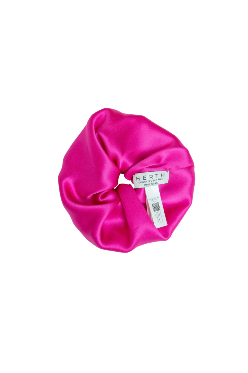 Edi scrunchie in hot pink organic silk — bold and sustainable hair accessory crafted by HERTH.