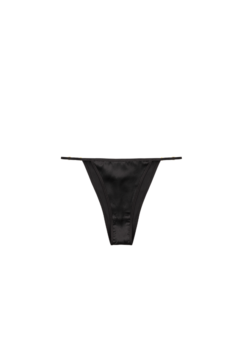 Front view of Elle adjustable panty in black organic silk — sleek and sustainable lingerie piece by HERTH, showcased in still life photography.