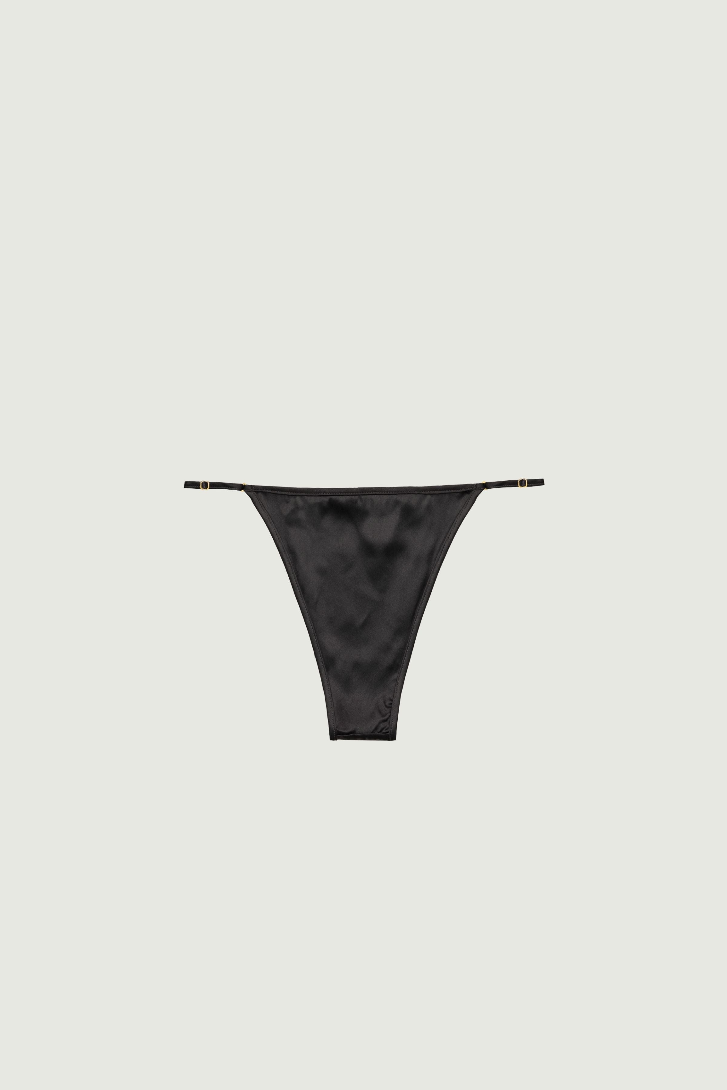 Black silk mid-rise panty, back view showing back coverage and thin adjustable straps
