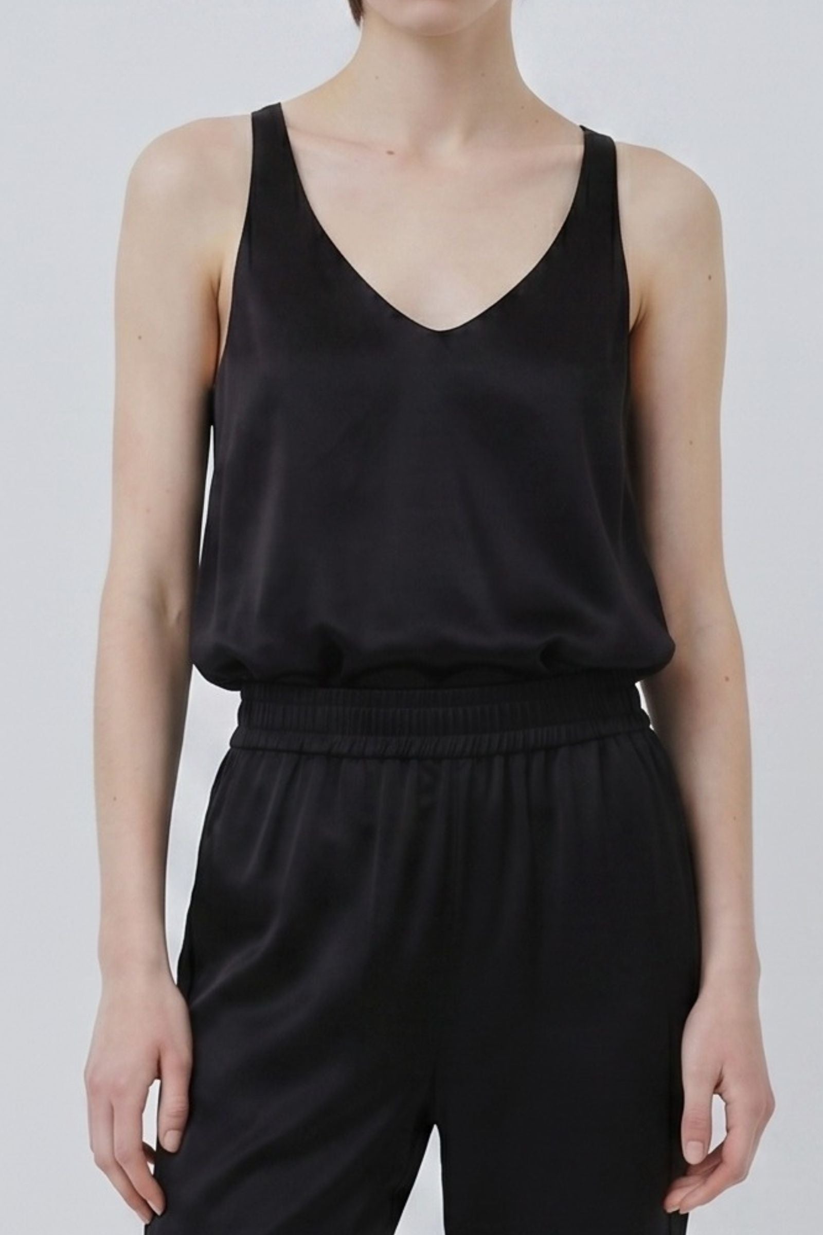 Black organic silk tank top with soft drape and relaxed fit