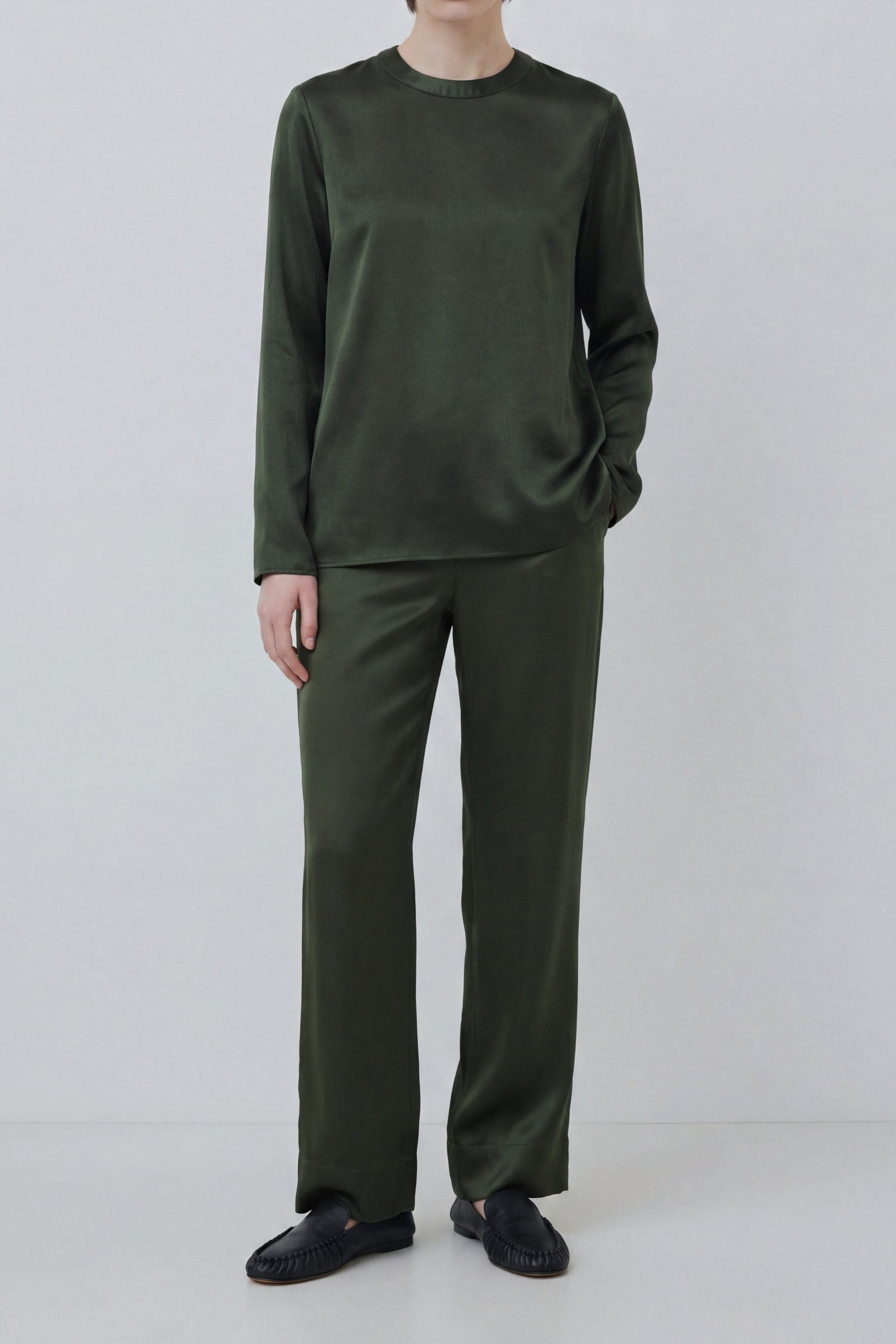 Organic silk Andie long sleeve top and Zeno trousers in green, full look with relaxed fit and fluid silhouette