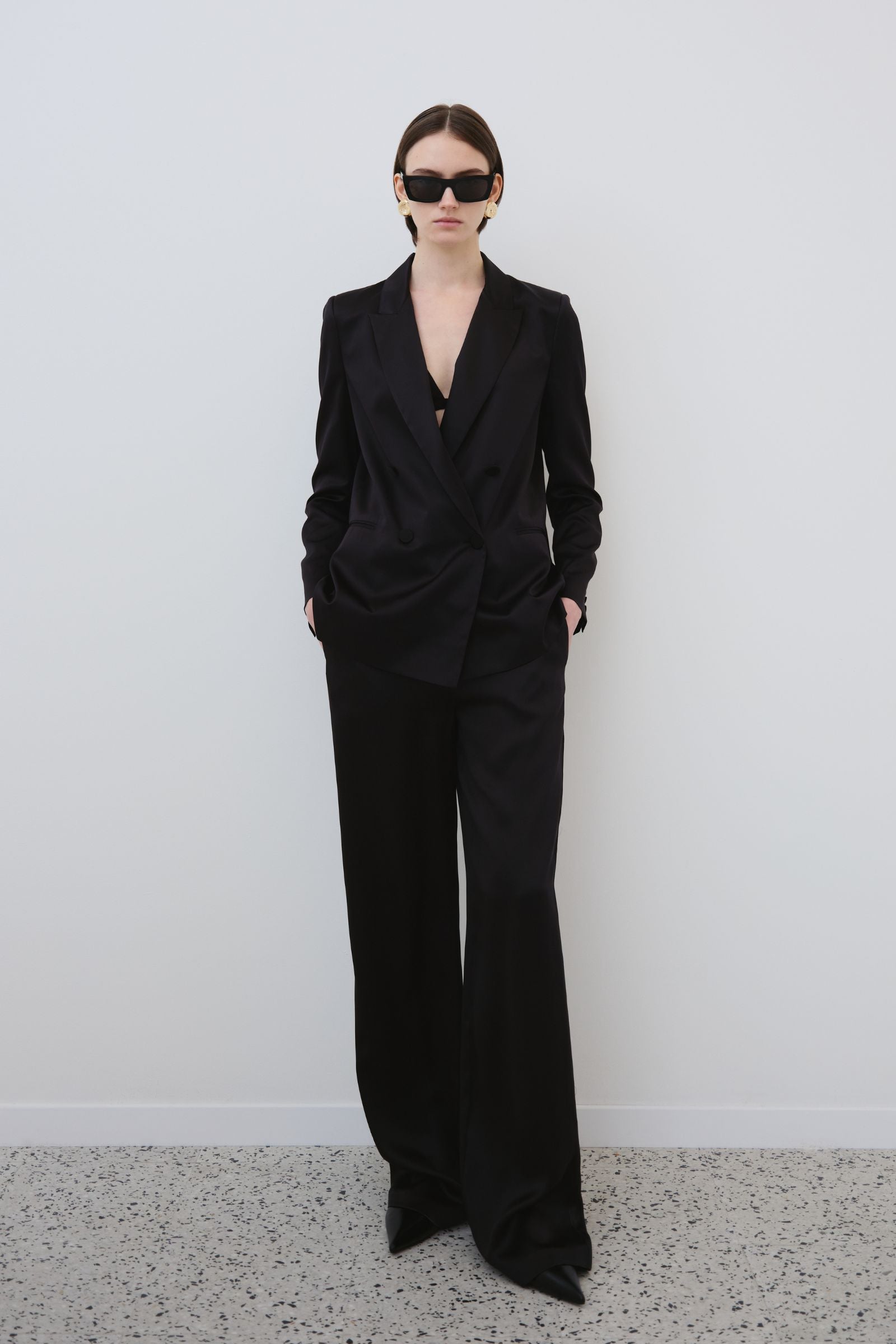 Black silk blazer and trousers set, organic silk garments crafted in Italy with fluid silhouette and refined tailoring