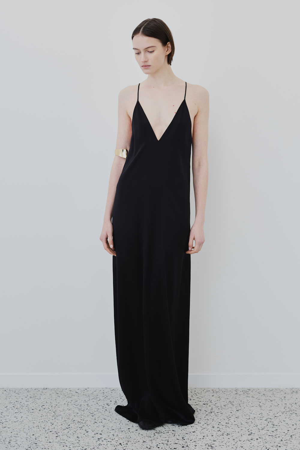 Front view of the INEZ slip dress in black GOTS-certified organic silk by HERTH — showcasing minimal design, timeless elegance, and sustainable womenswear craftsmanship.