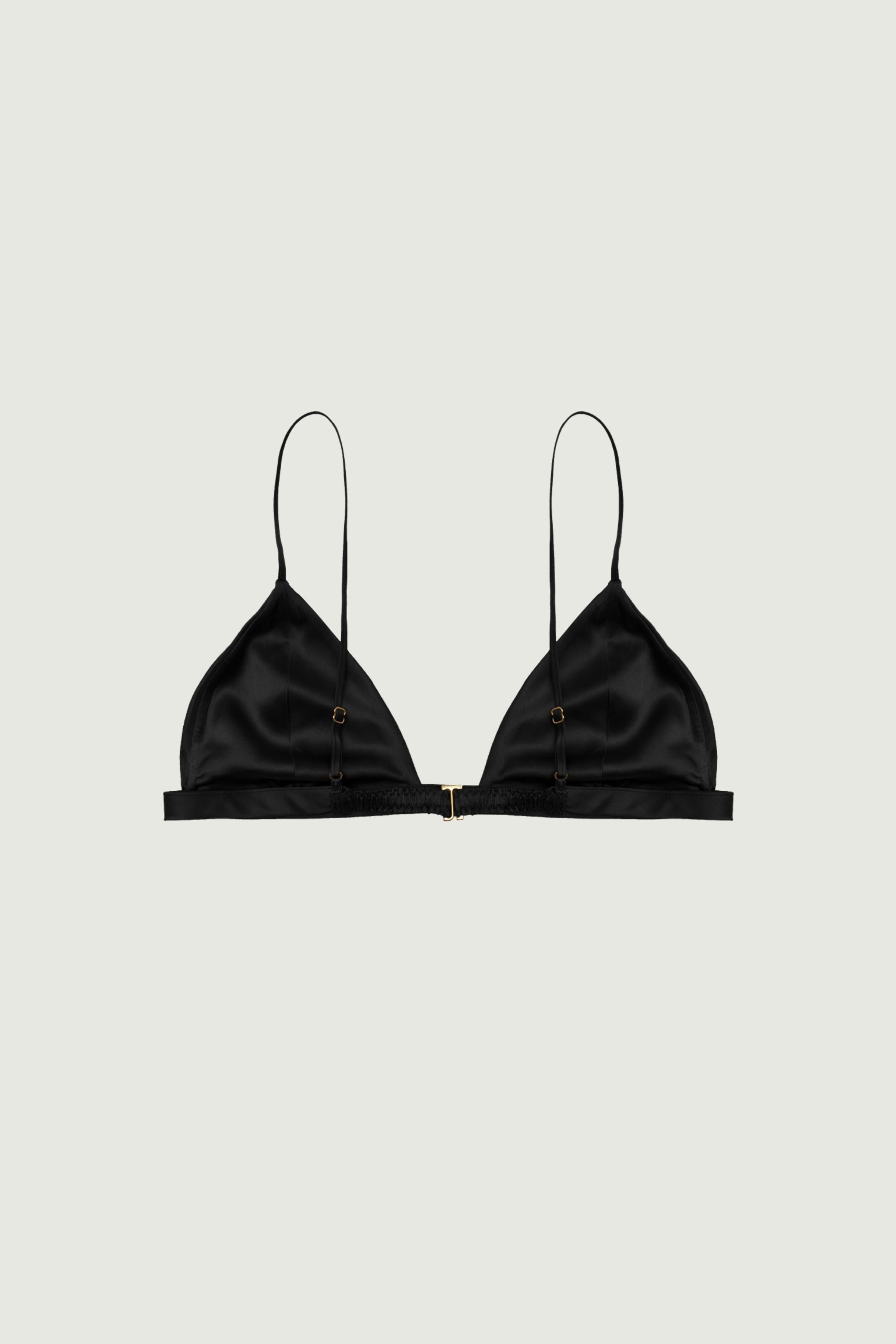 Black silk triangle bra back view with adjustable straps and hook closure, smooth band and minimal construction for a refined fit