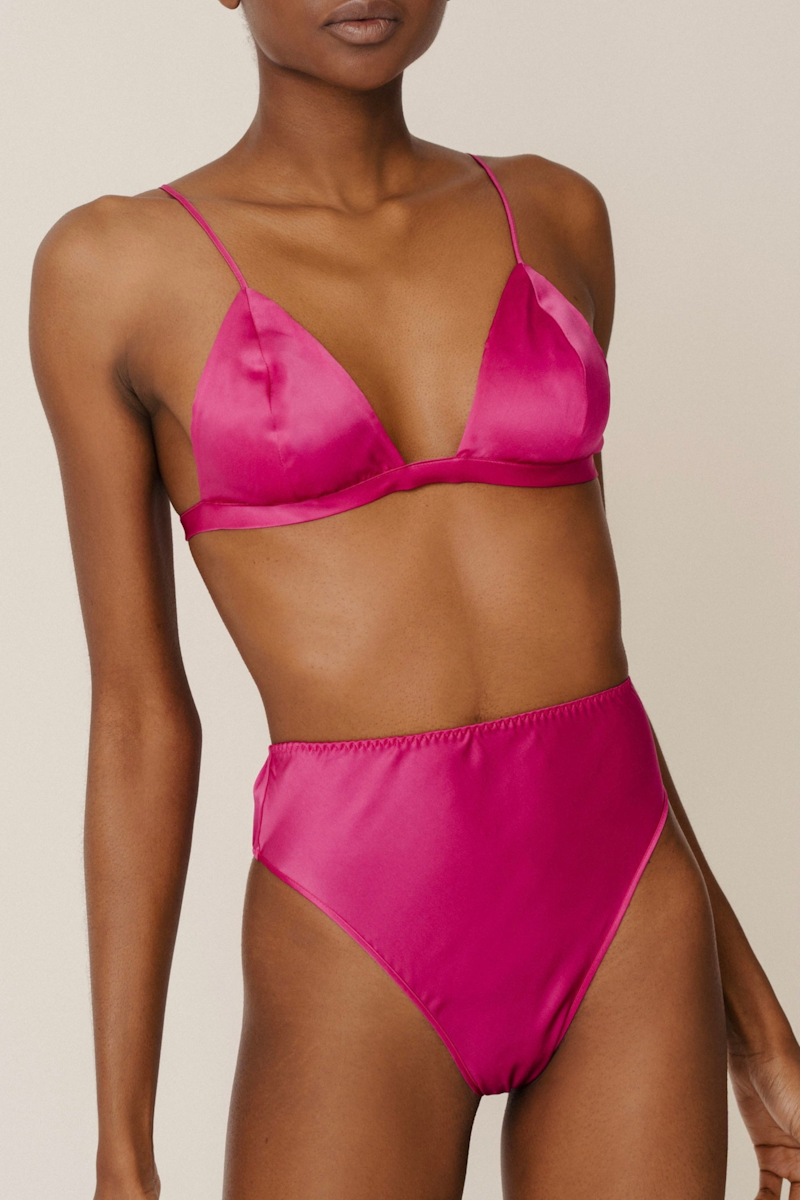 Ivy triangle bra and Thea high-rise panty in hot pink — sustainable organic silk lingerie set by HERTH with a bold and elegant silhouette.