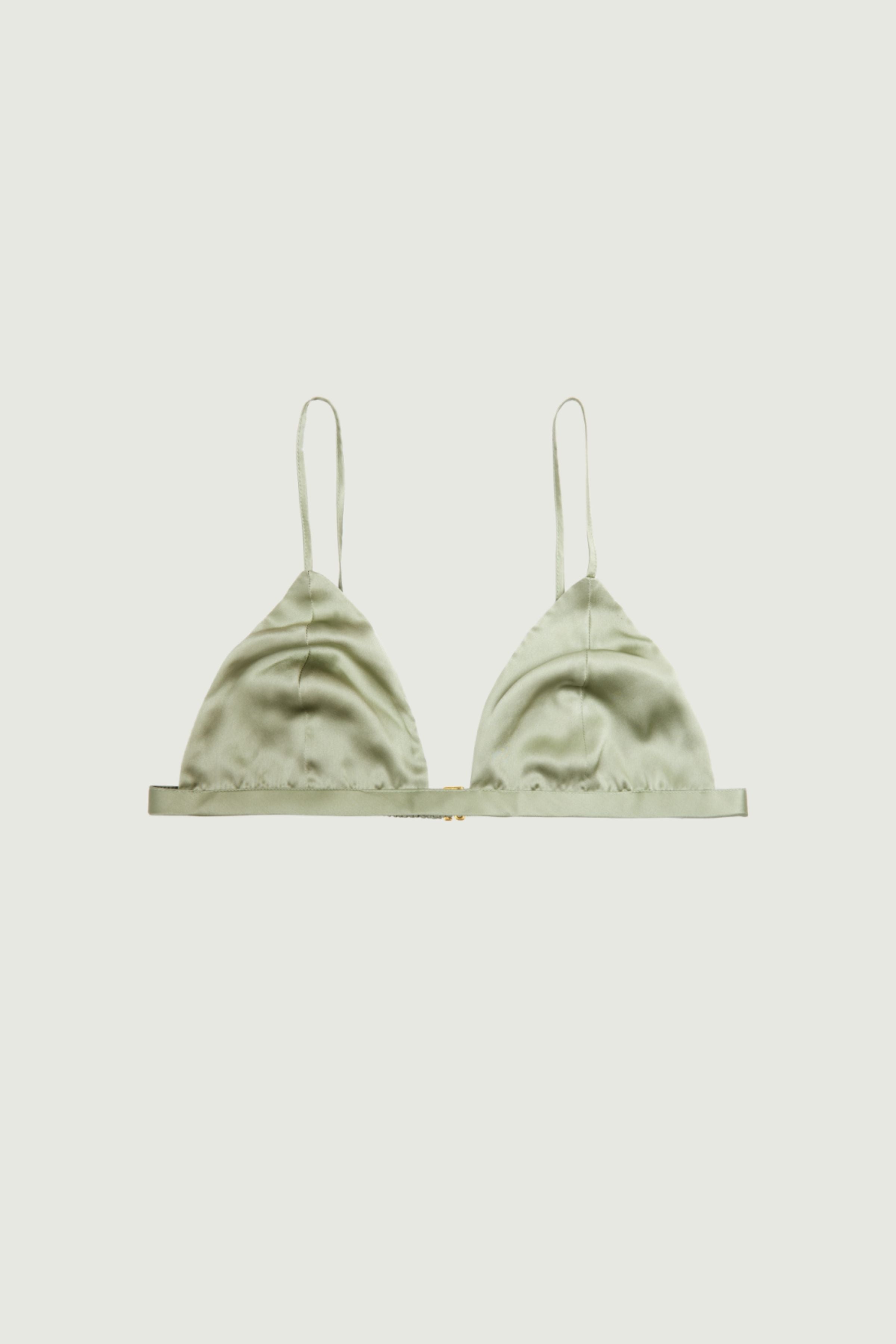 Tea green silk triangle bra with soft cups and thin adjustable straps, front view highlighting muted tone and fluid natural silhouette
