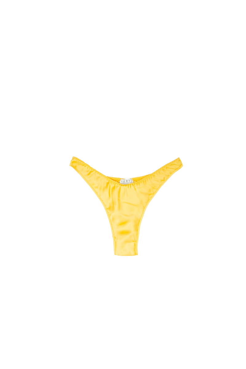 Jude high cut leg panty in Mango organic silk — vibrant and sustainable lingerie piece crafted by HERTH with GOTS-certified silk.