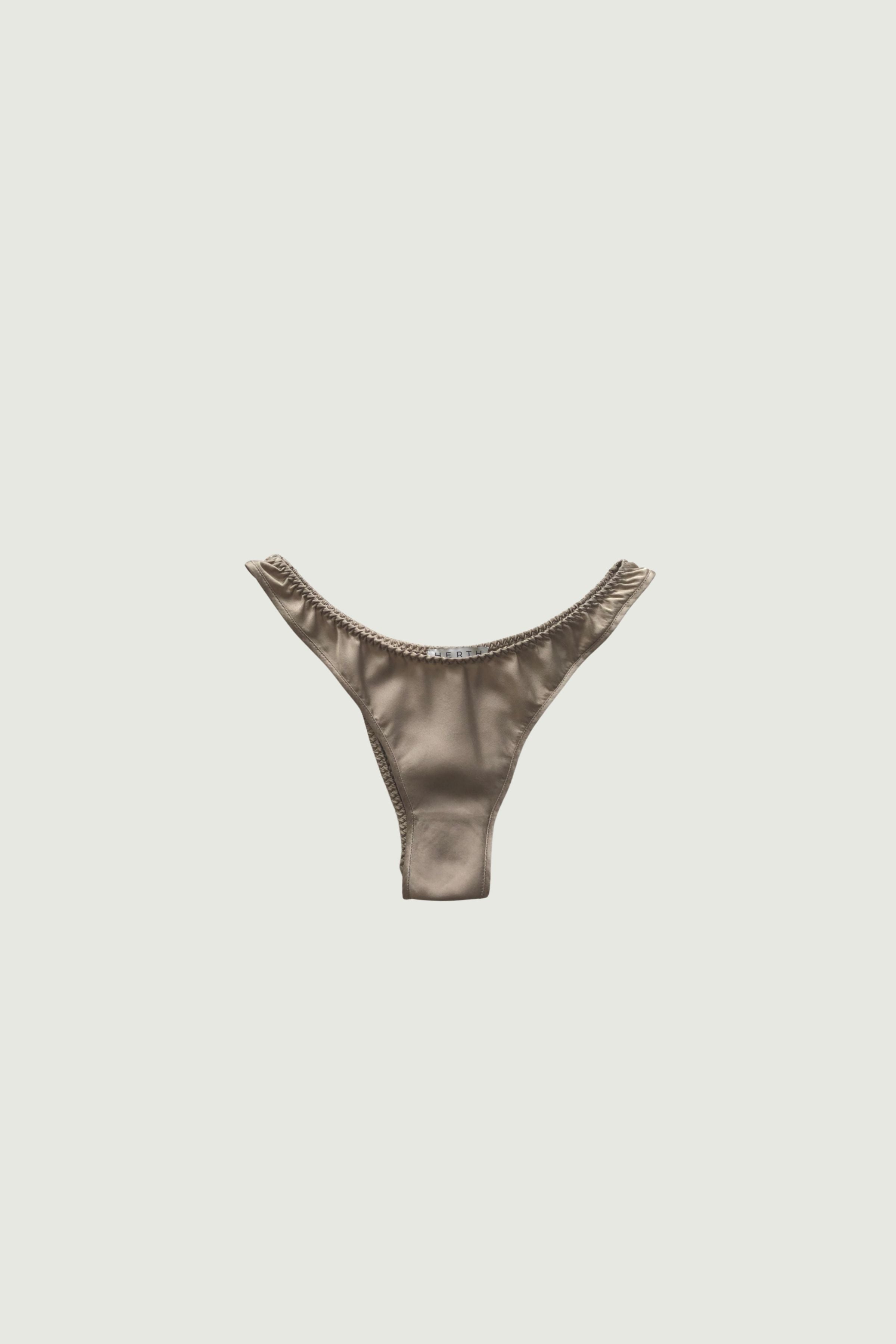 Gold sand silk high-cut panty with minimal coverage, front view highlighting high-cut leg and luminous neutral tone