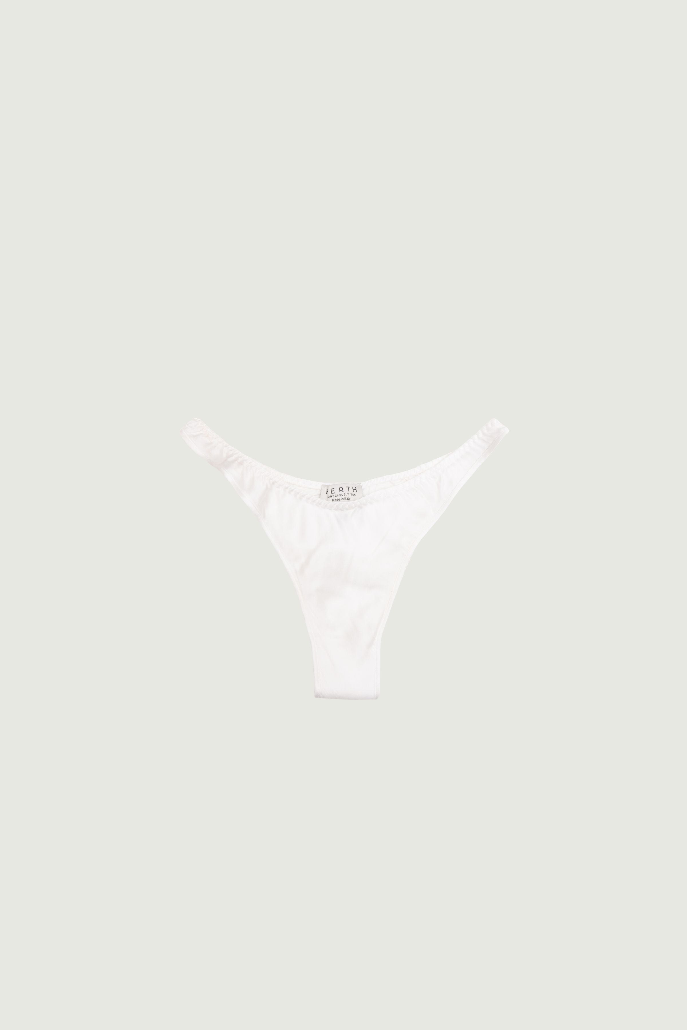 Ivory silk high-cut panty with minimal coverage, front view highlighting high-cut leg and clean light tone