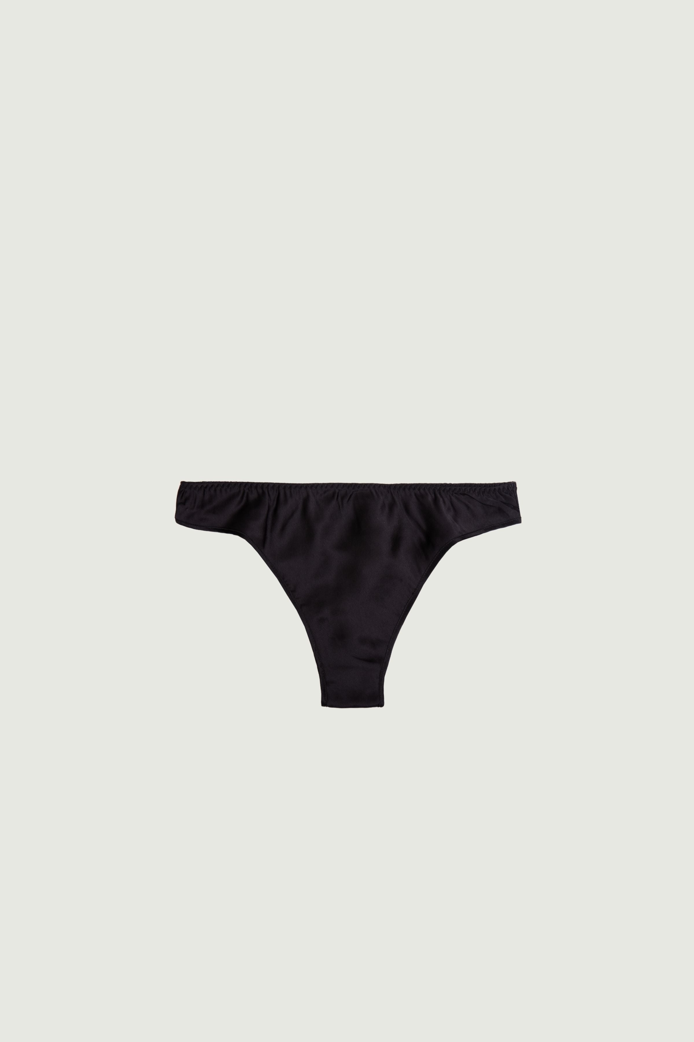 Black silk mid-rise panty, front view showing clean shape and smooth fabric