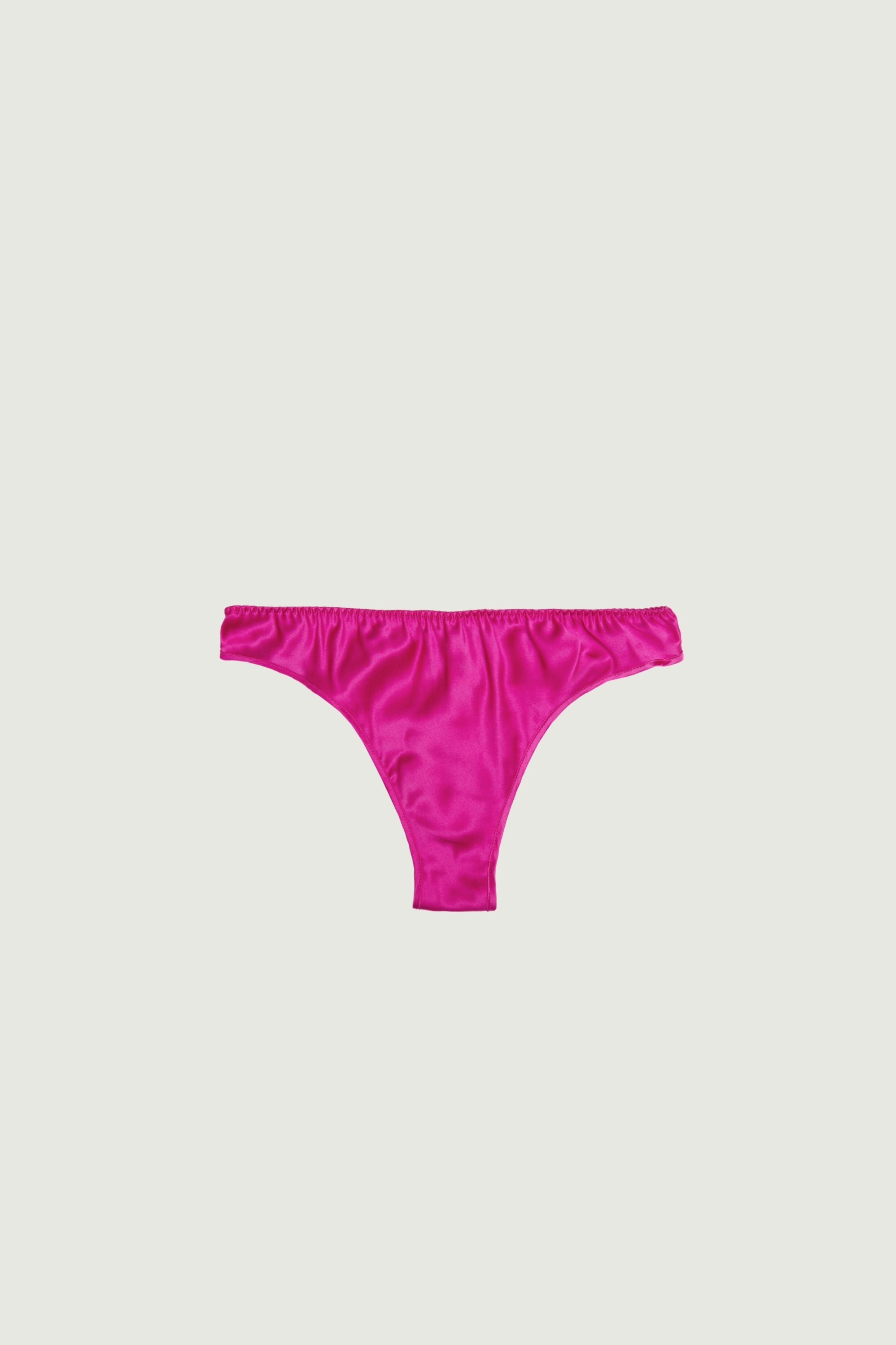 Hot pink silk mid-rise panty, front view showing smooth fit and bright color