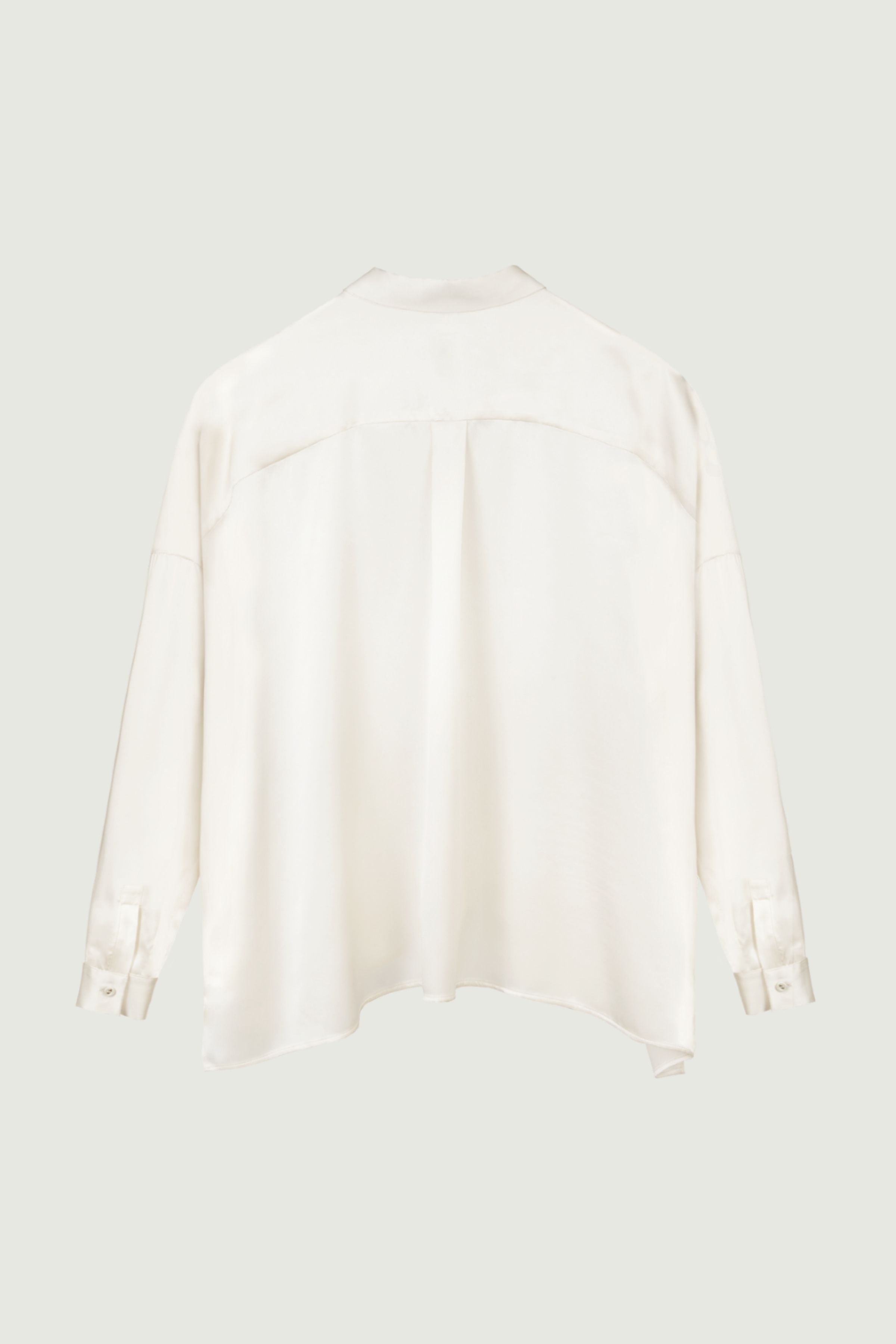Almond silk shirt with relaxed fit and soft drape, back view with fluid movement and clean minimal construction