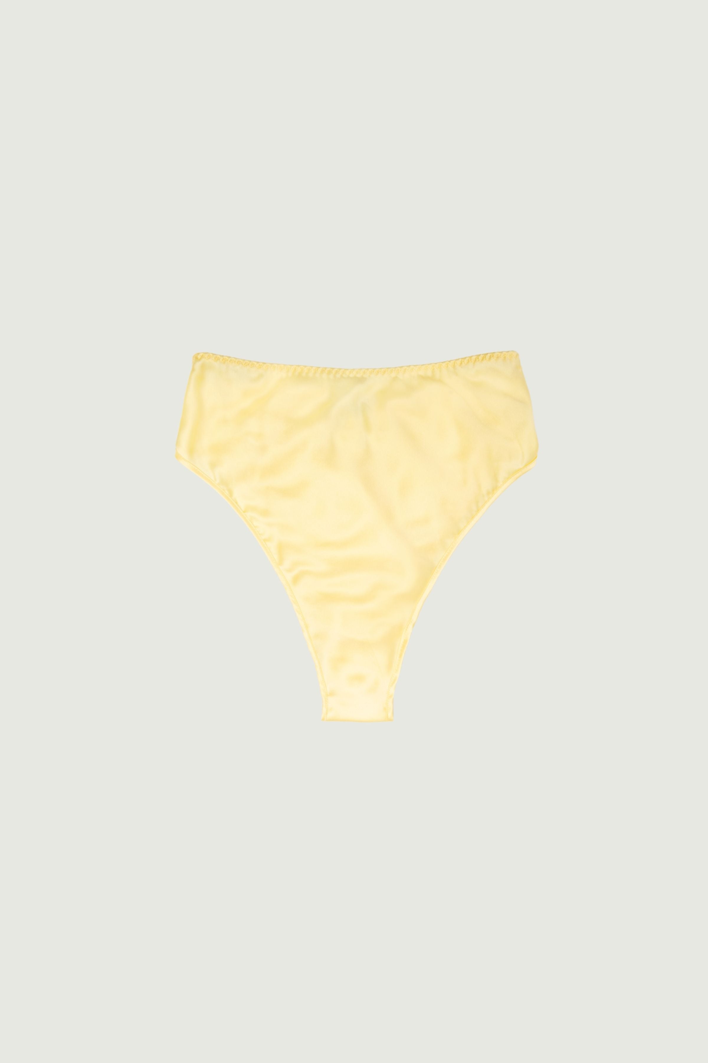 Butter yellow silk high-rise panty, front view highlighting soft sheen and bright pastel tone