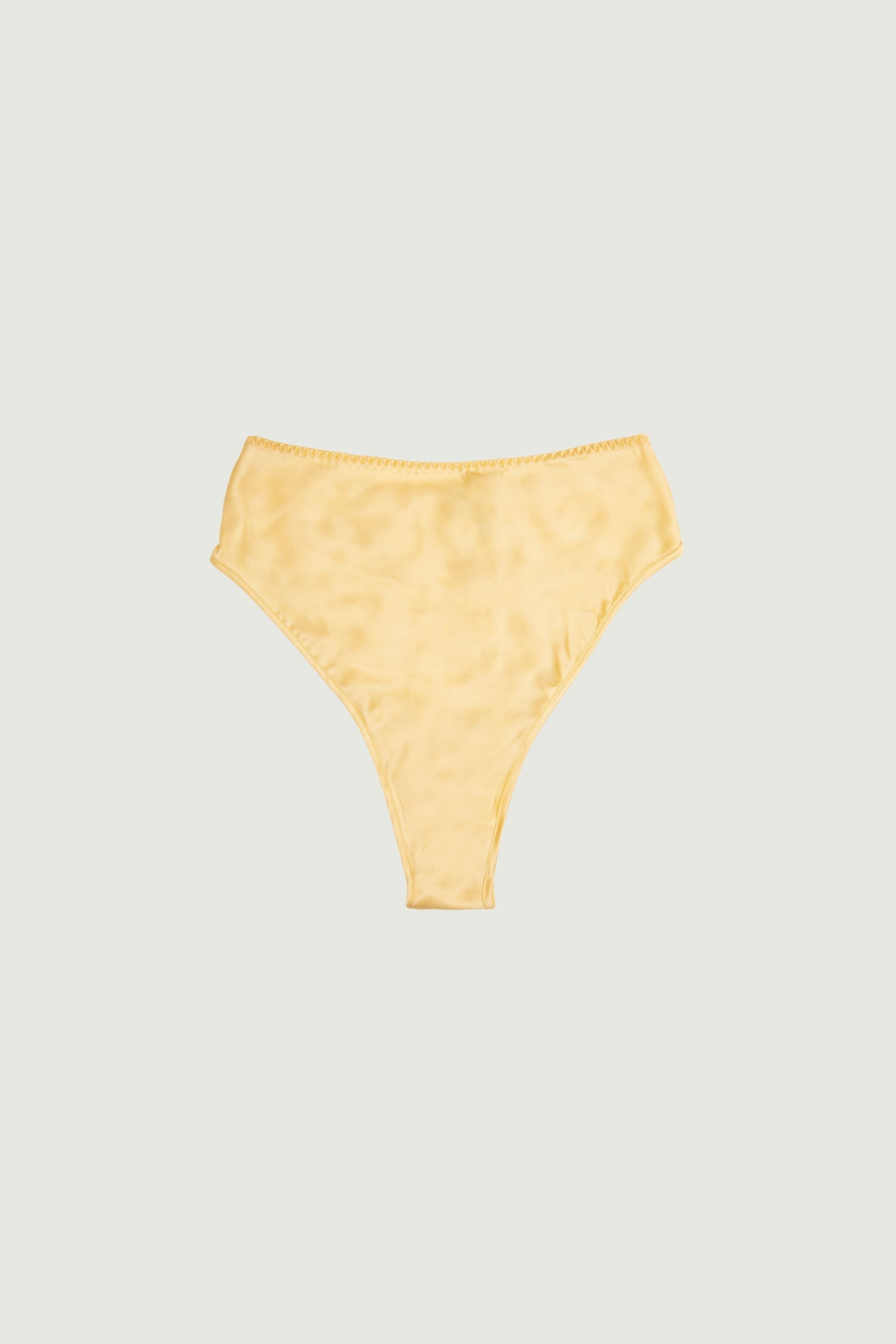 Desert tone silk high-rise panty with full coverage, front view highlighting warm earthy hue and smooth silhouette