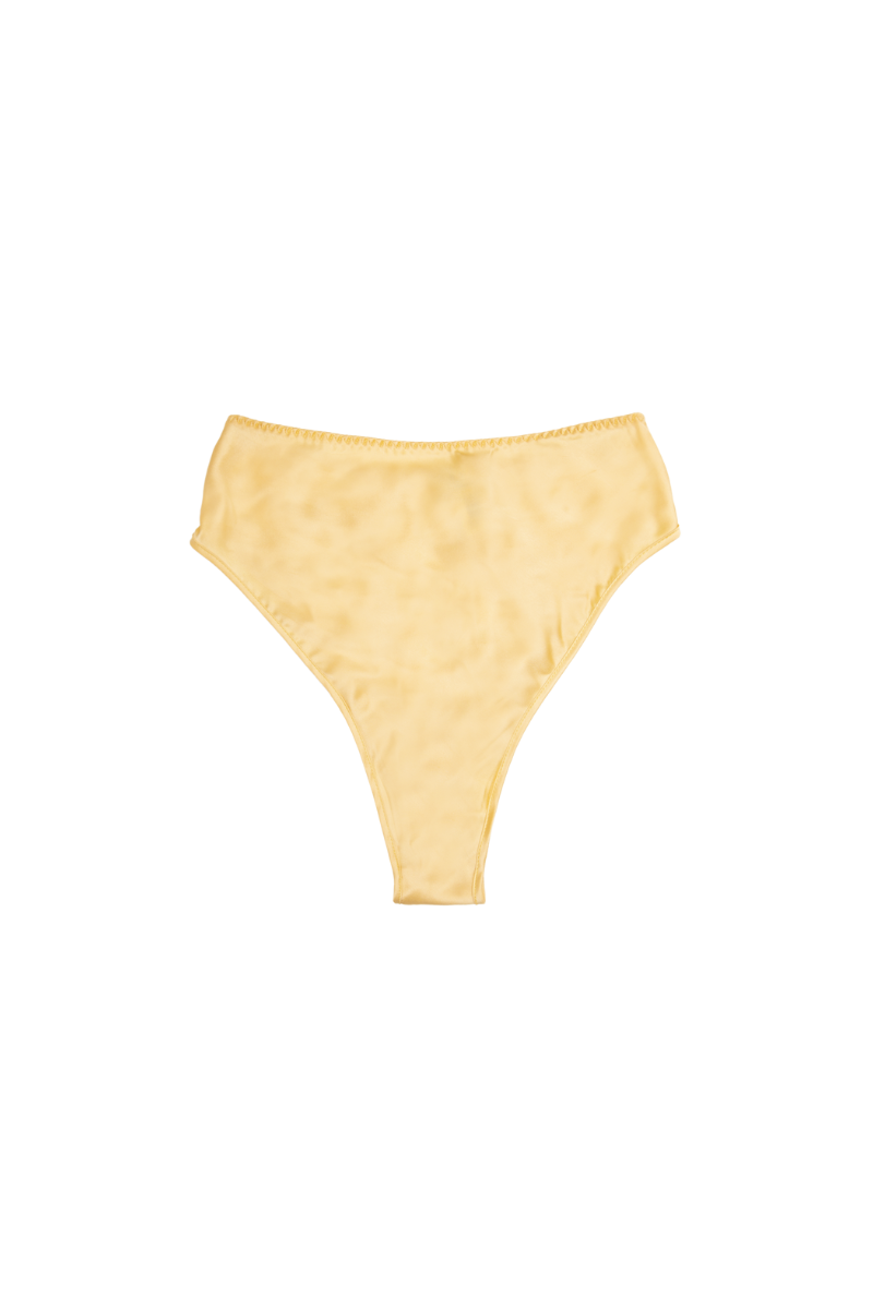 Thea high-waist panty in Desert by HERTH – minimal cut in GOTS-certified organic silk, sustainably crafted in Italy.