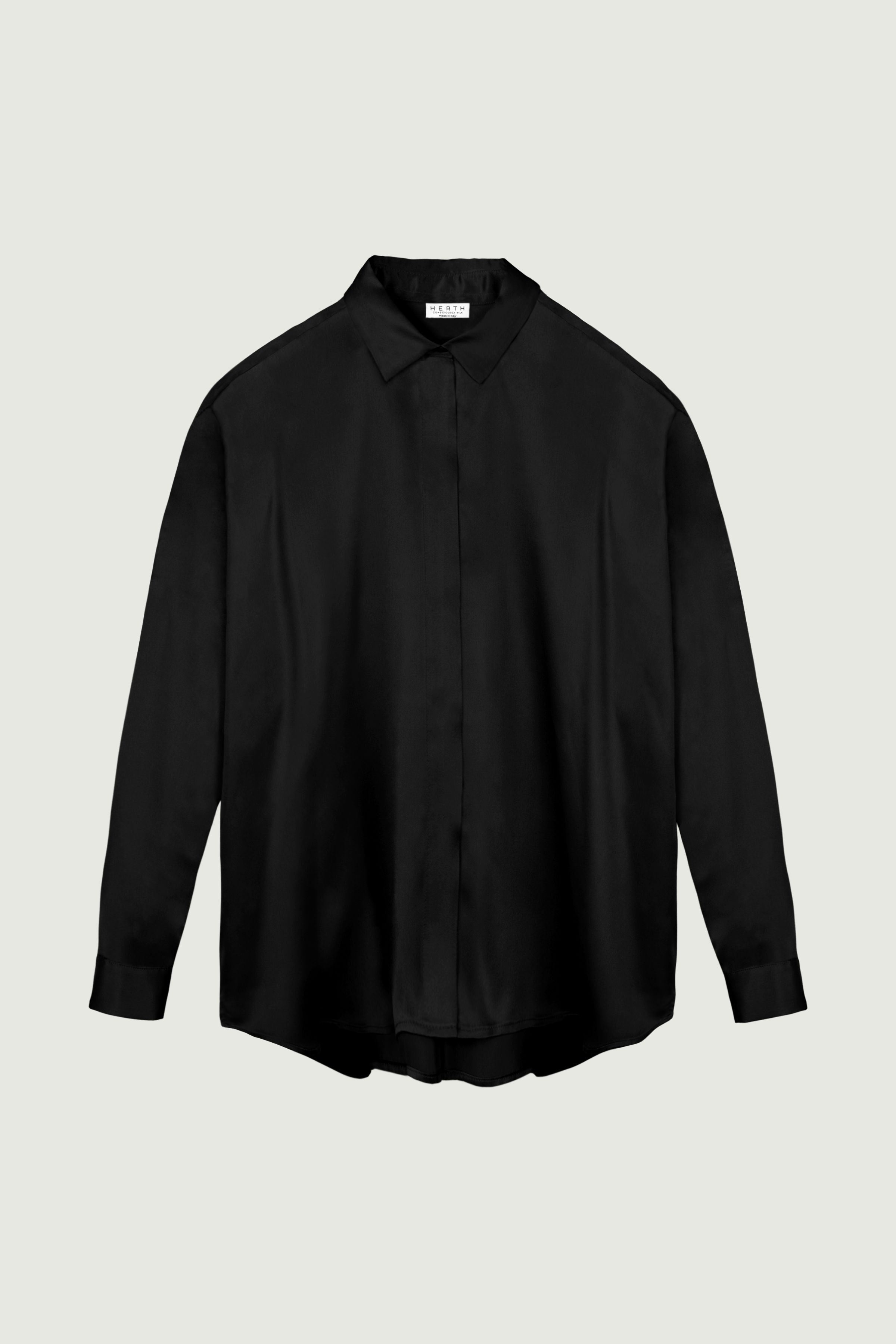 Black silk shirt with relaxed fit, long sleeves and clean button-down front, fluid drape and minimal silhouette