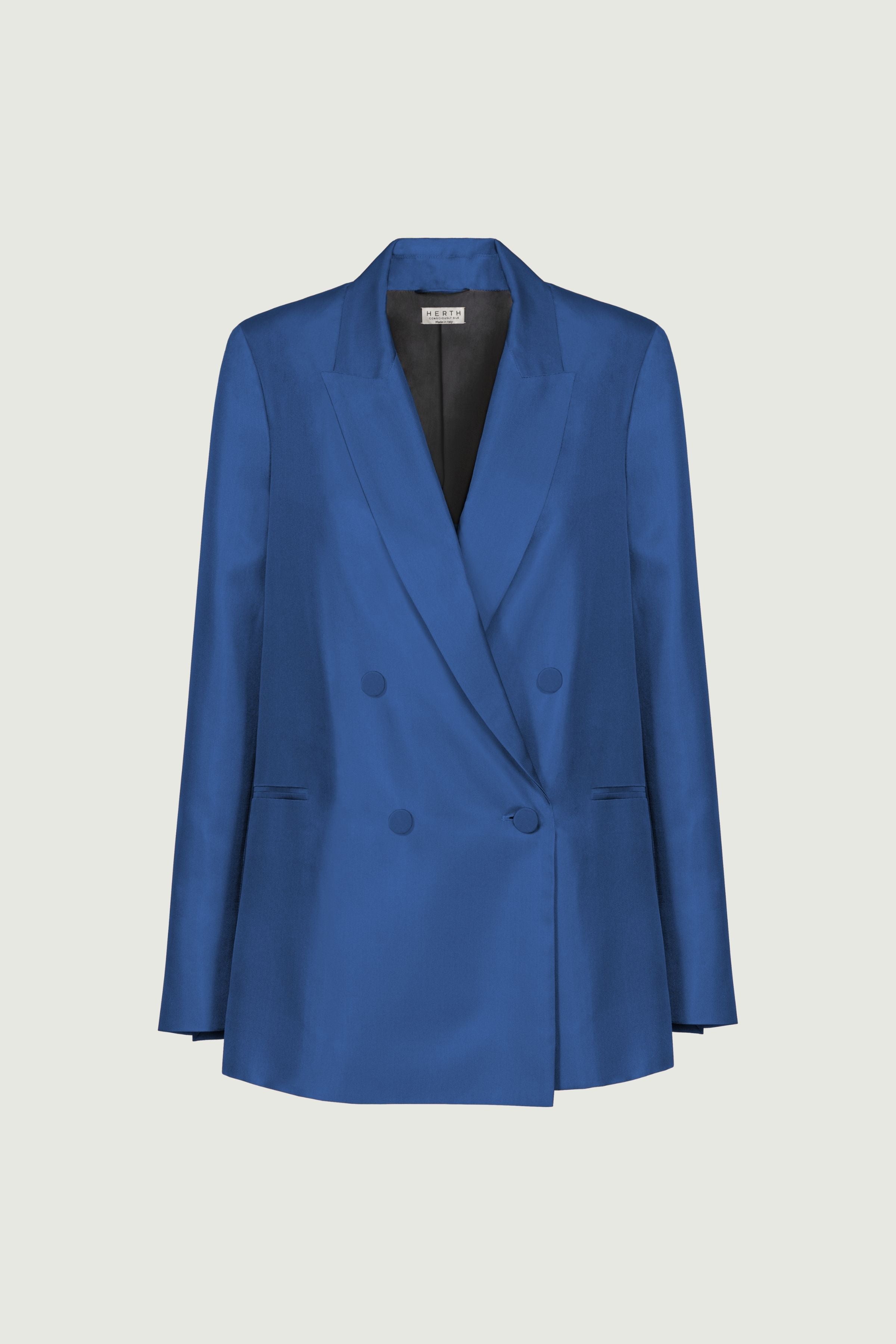 Denim blue silk twill double-breasted blazer with structured fit and sharp shoulders, textured fabric and modern tailored silhouette, front view